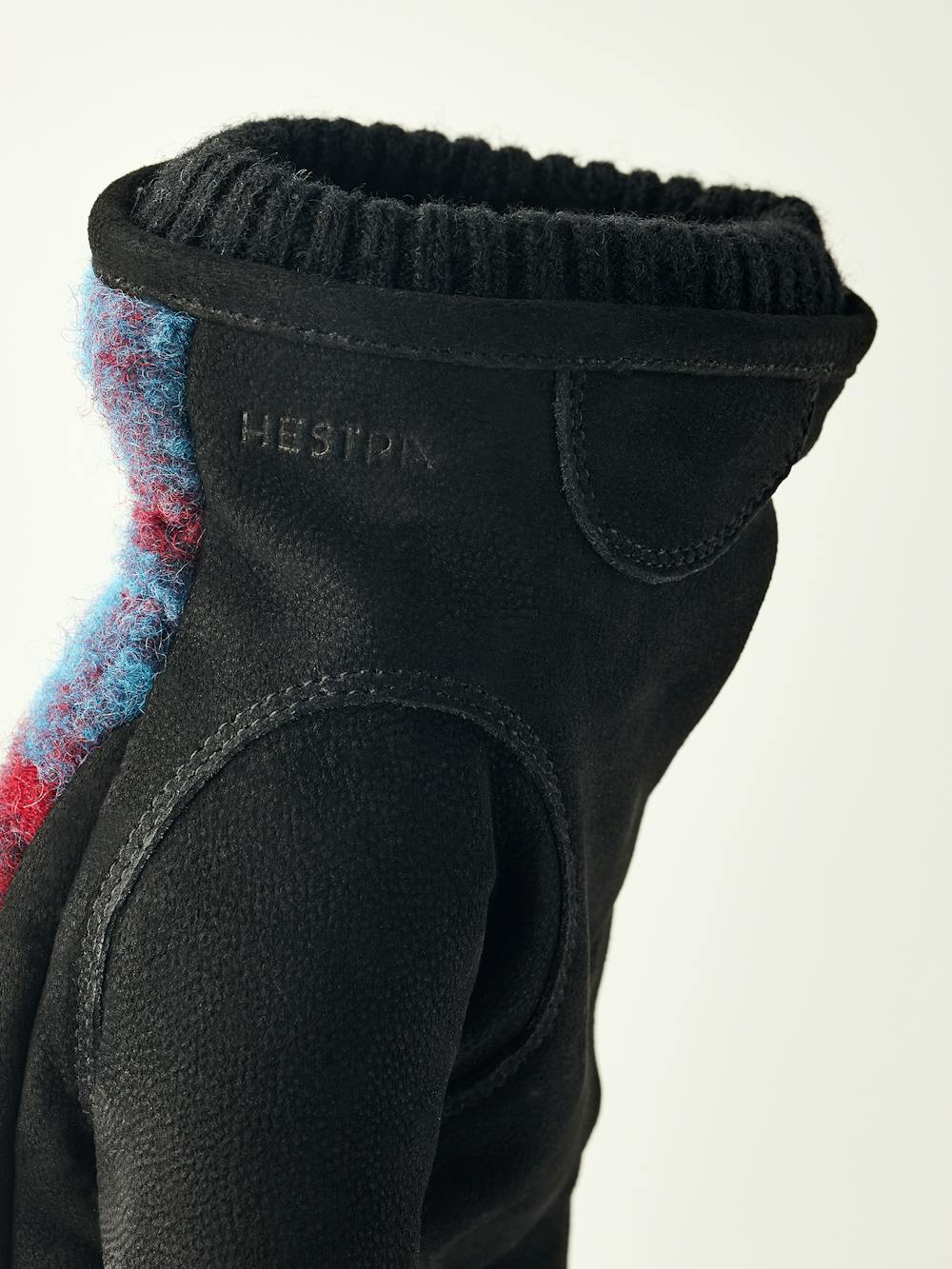 Dark blue machine-sewn goat nubuck glove with multicolored wool jersey back
 (4 of 4)