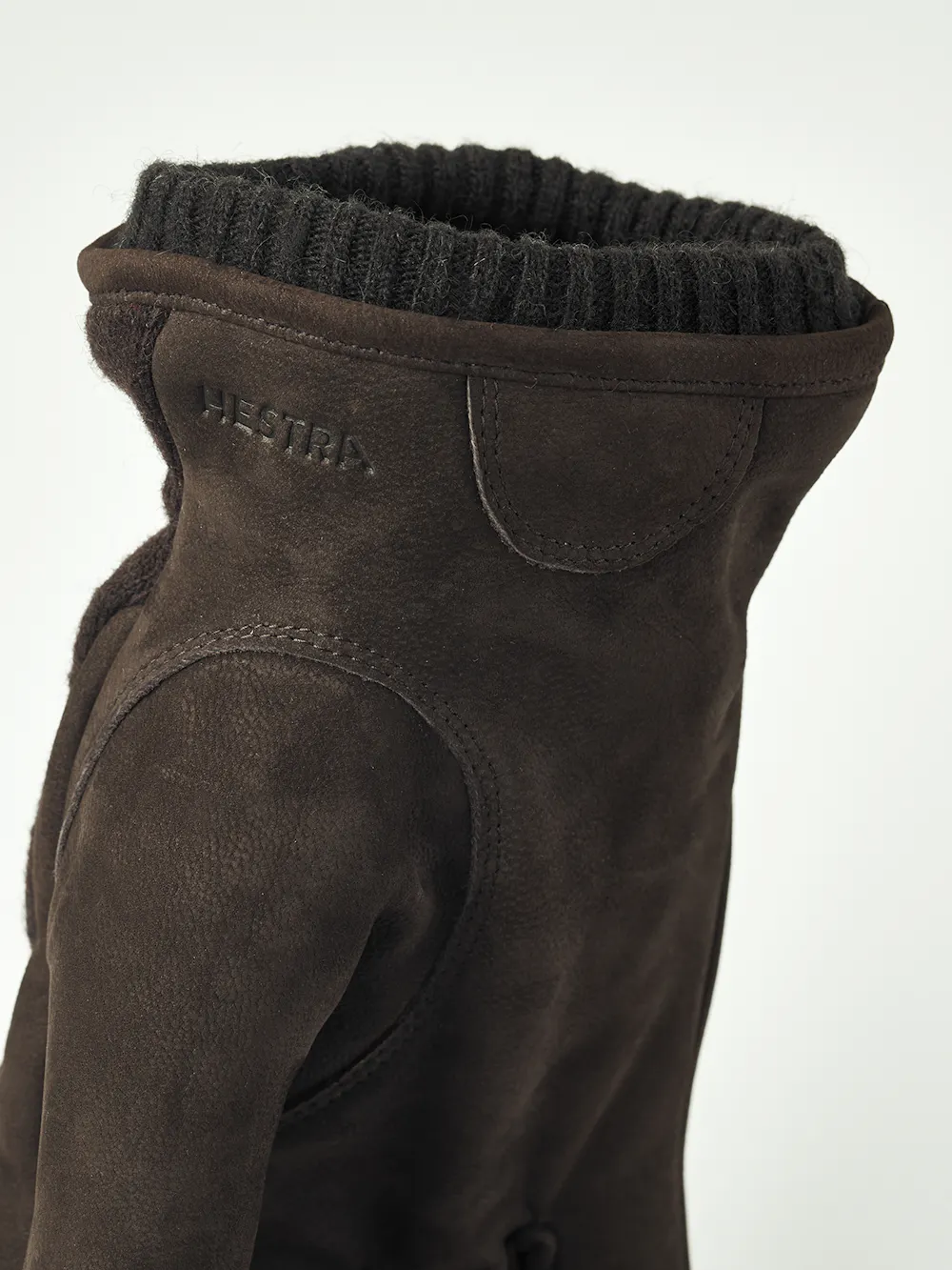 Dark brown machine-sewn goat nubuck glove with wool jersey back
(2 of 4)