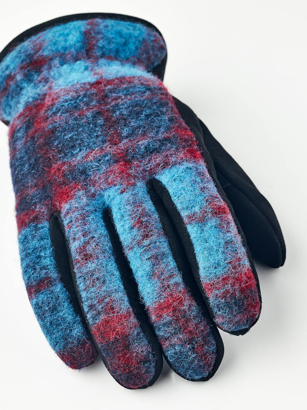 Dark blue machine-sewn goat nubuck glove with multicolored wool jersey back
 (2 of 4)