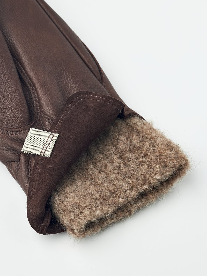 Brown deerskin mitten with extended wool lining
 (3 of 8)