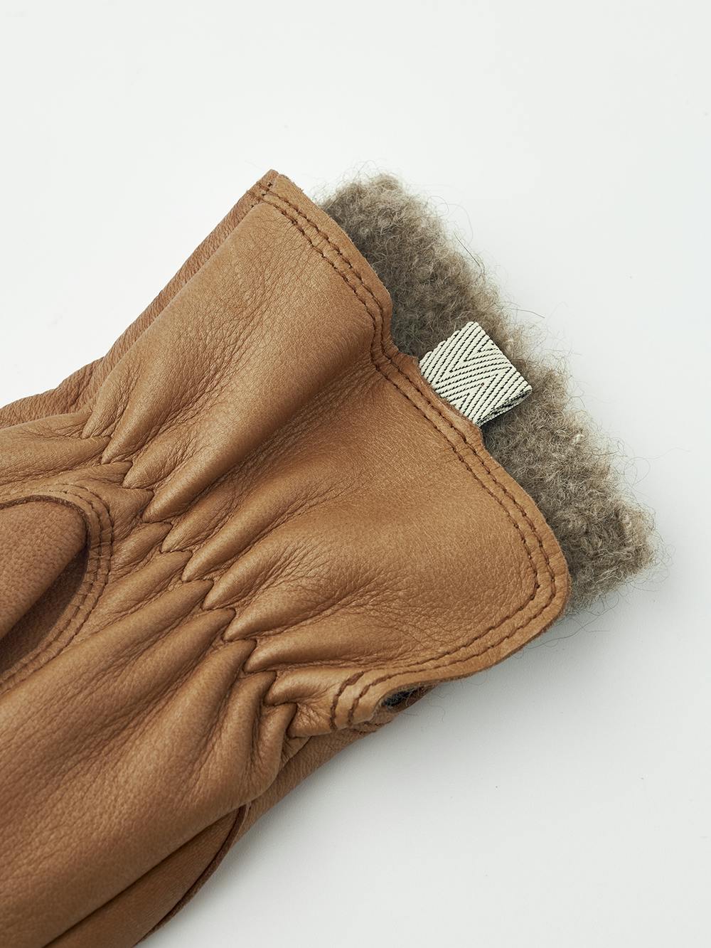 Light brown deerskin mitten with extended wool lining
(4 of 5)