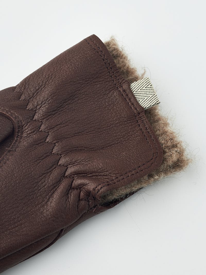 Brown deerskin mitten with extended wool lining
 (6 of 8)