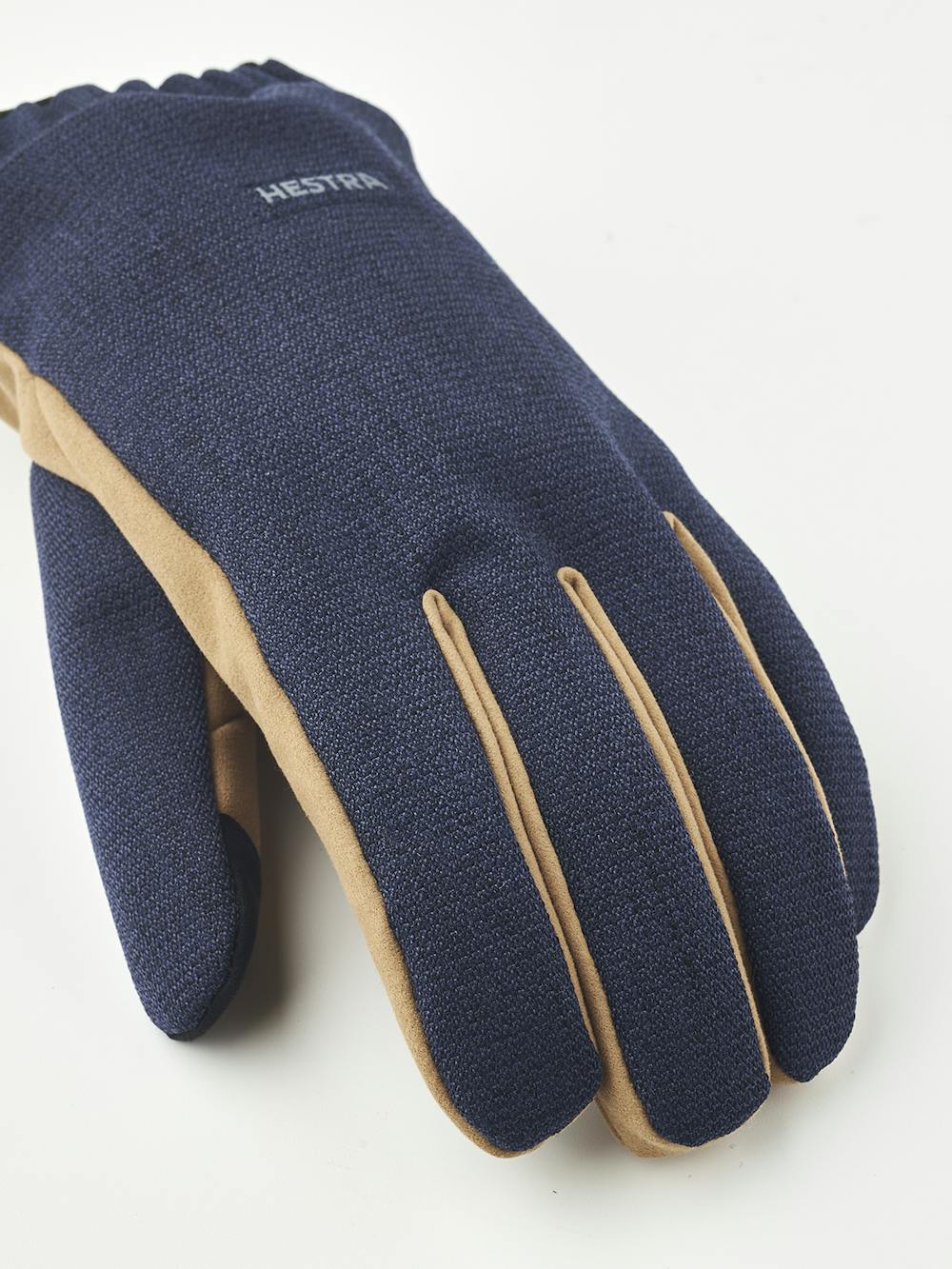 Dark blue fabric glove with beige-yellow palm
 (7 of 8)