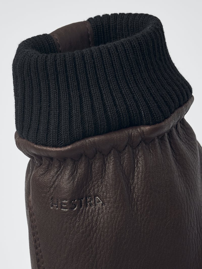 Brown machine-sewn deerskin glove with knitted cuff

 (2 of 4)