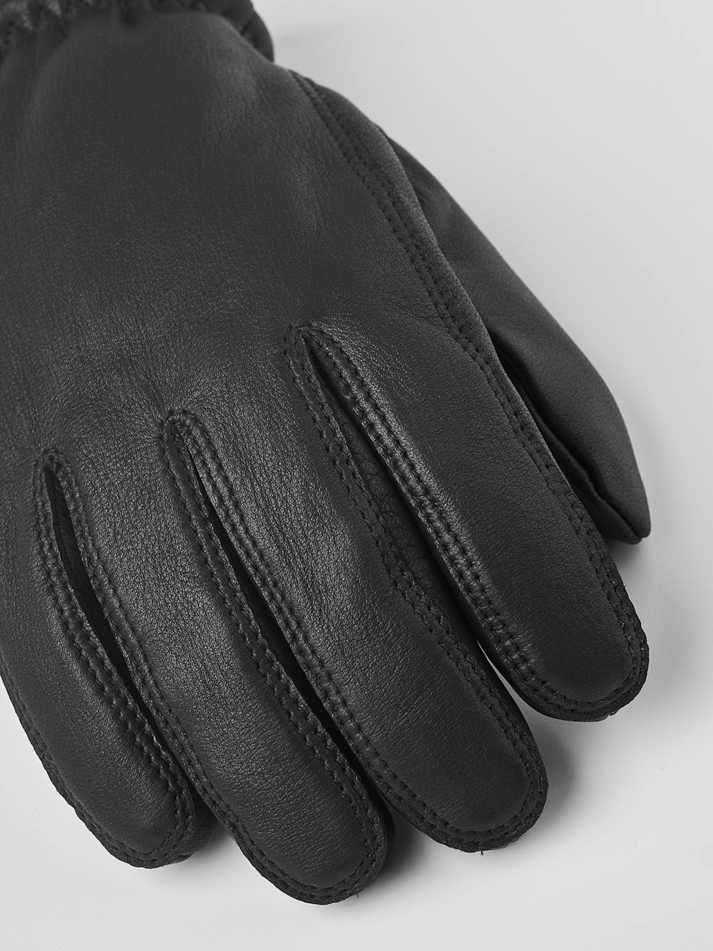 Black machine-sewn deerskin glove with knitted cuff
 (3 of 4)