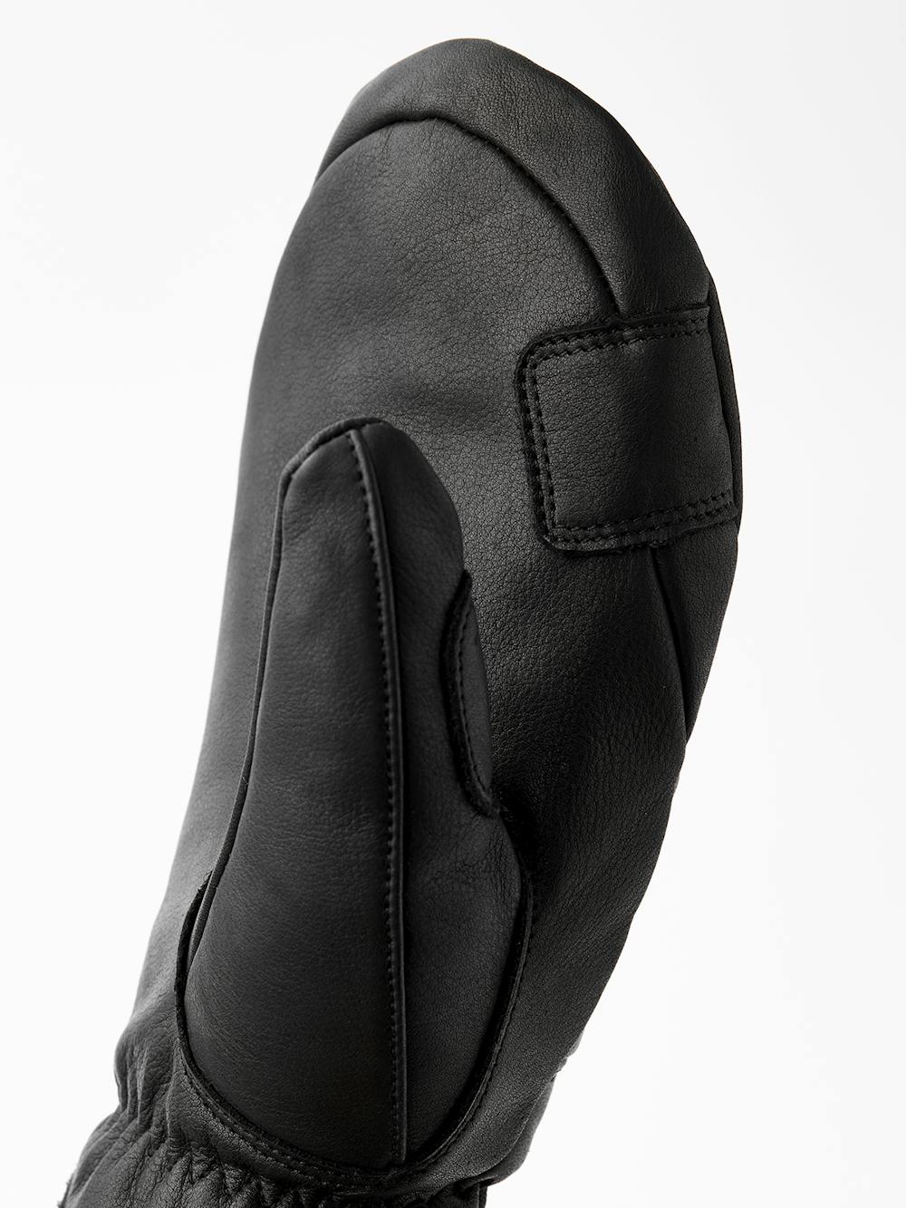 Svart tumhandske i nötnappa
 (6 av 8)