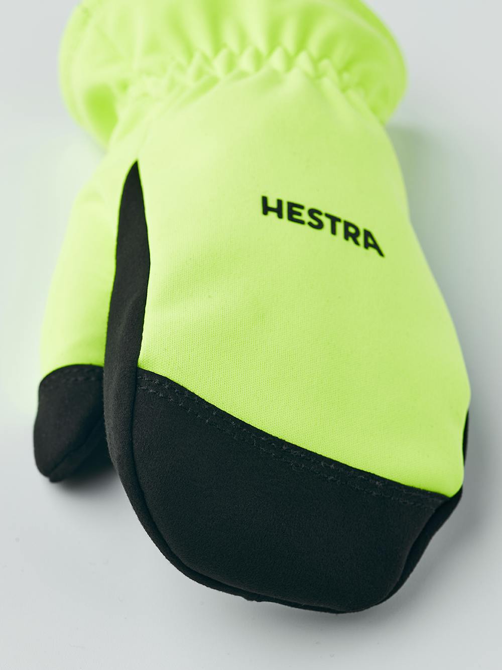 Gul tumhandske i tyg
(2 av 4)