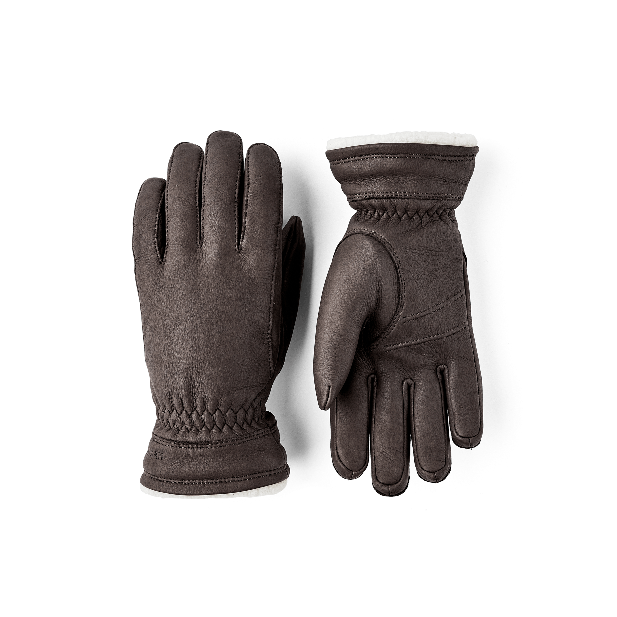 Dark brown machine-sewn deerskin glove with white trim
(1 of 4)