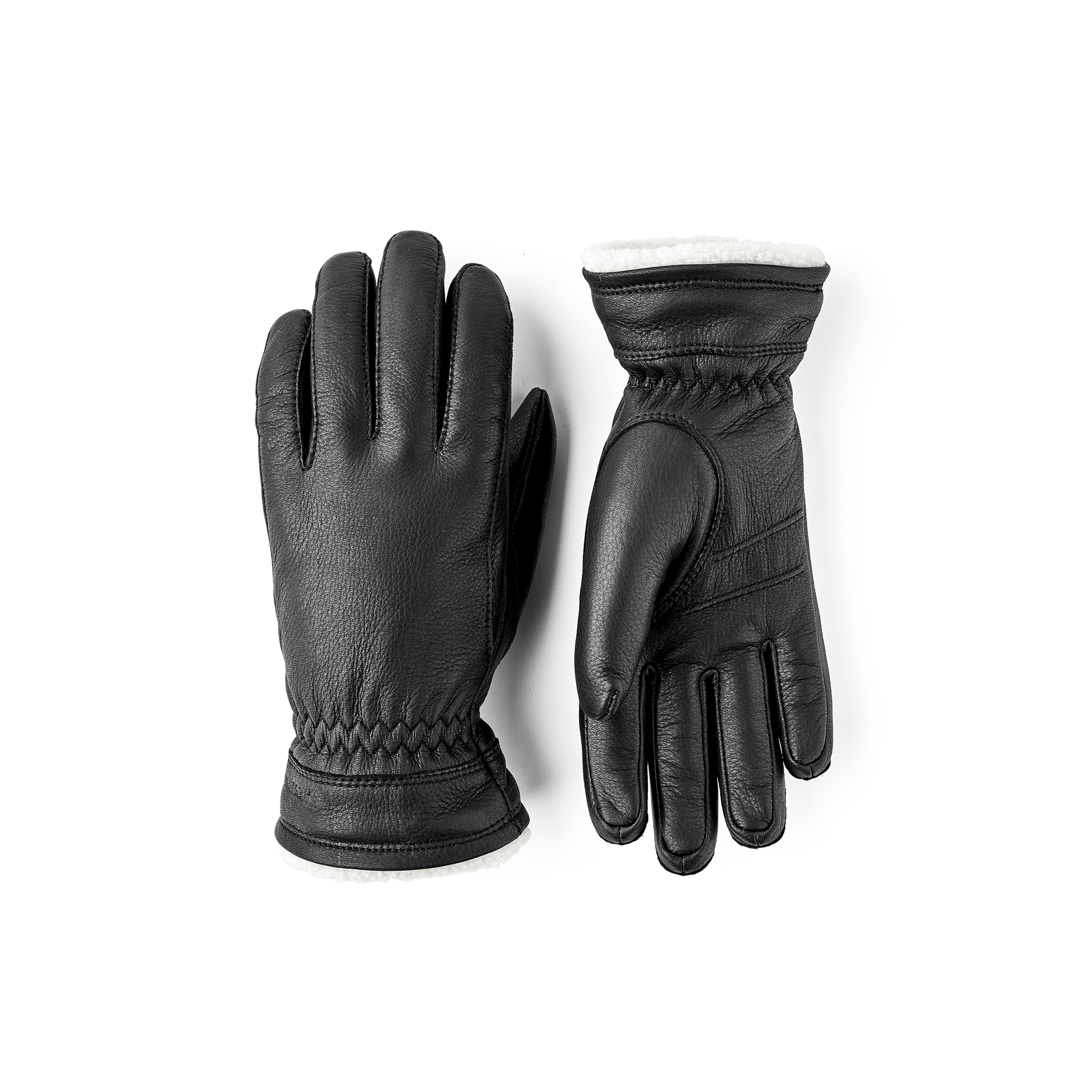 Black machine-sewn deerskin glove with white trim
 (1 of 4)
