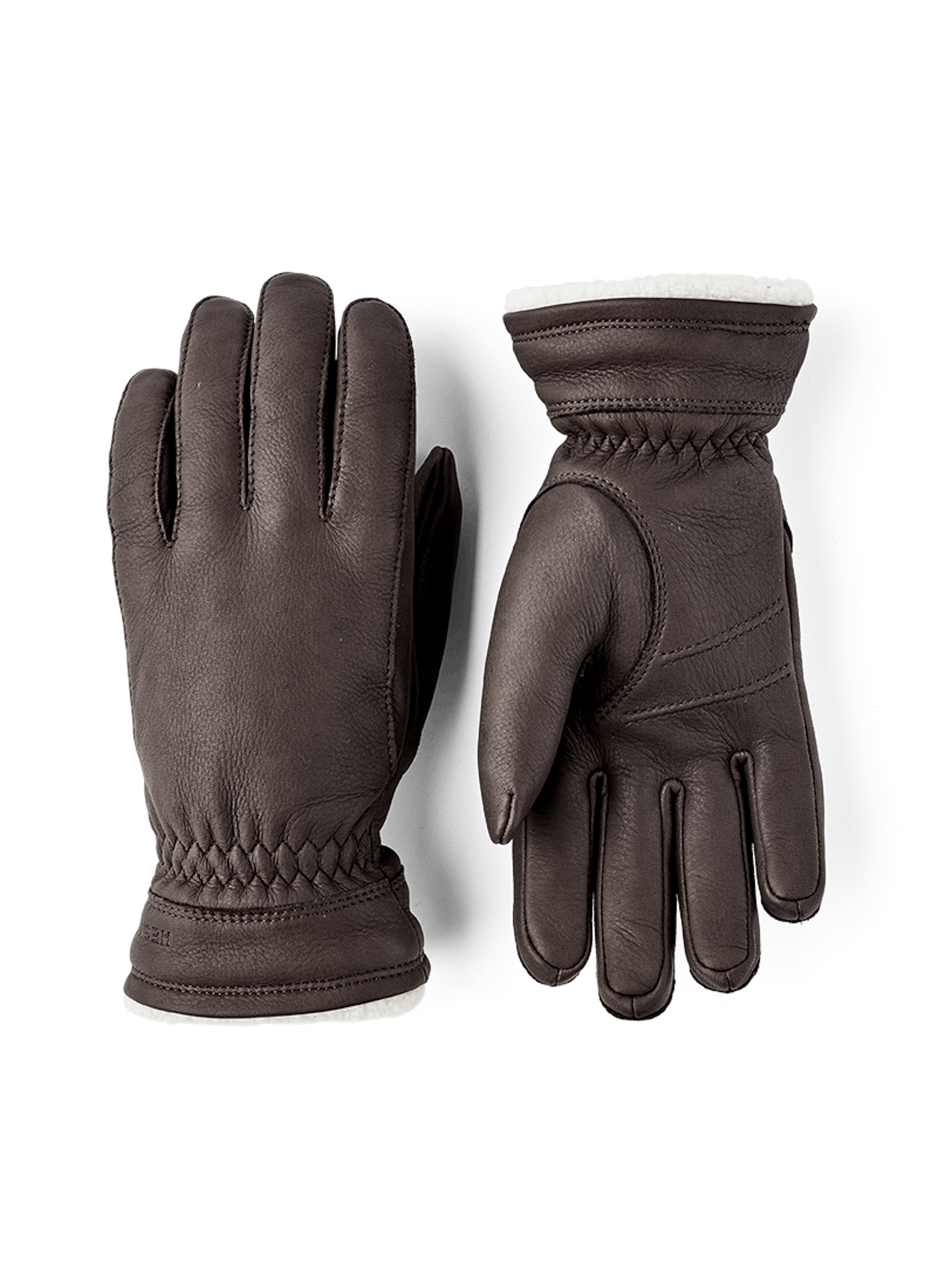 Dark brown machine-sewn deerskin glove with white trim
(1 of 4)