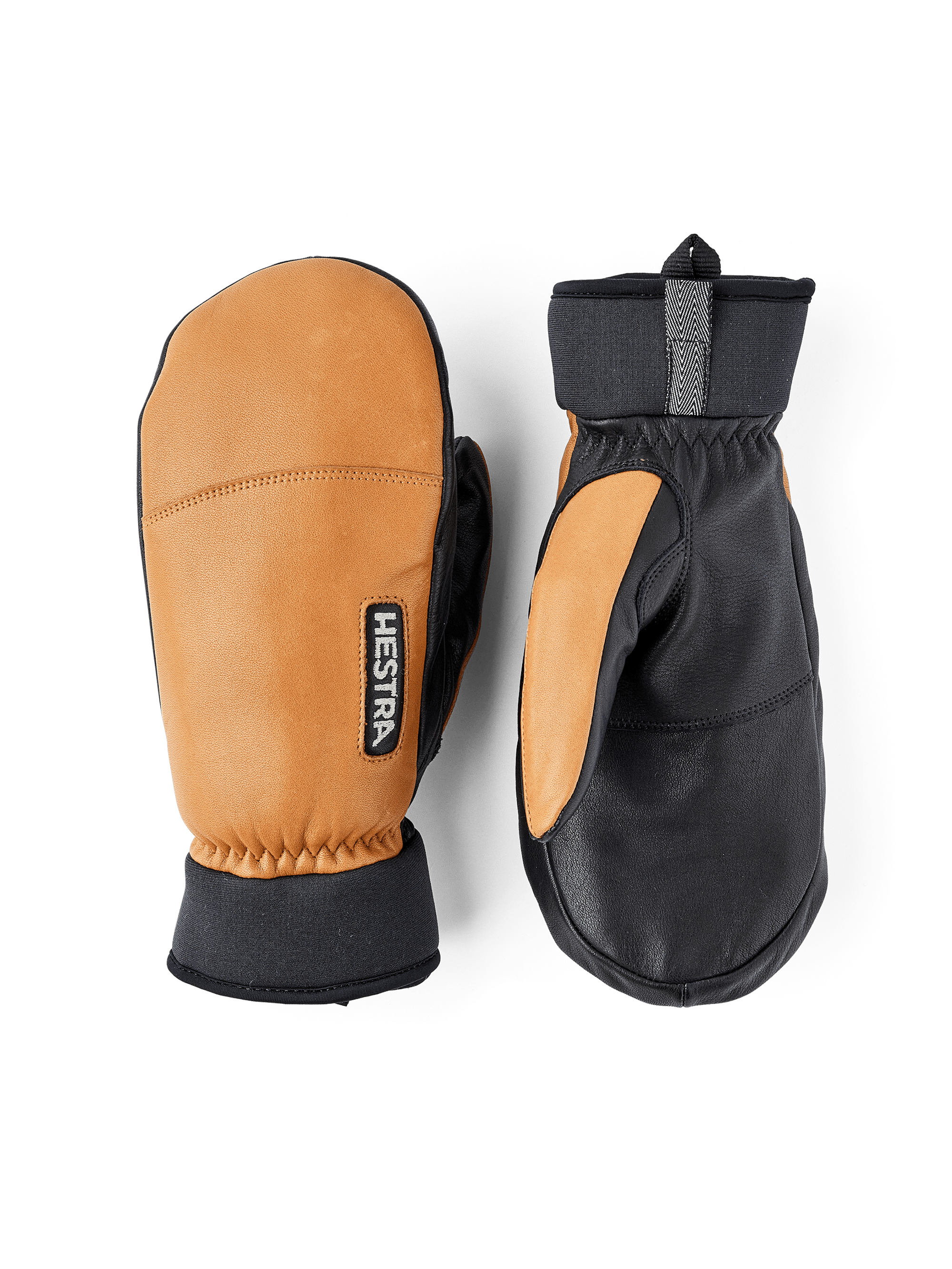 Ljusbrun tumhandske i getskinn och nötnappa med svart innerhand
(1 av 8)