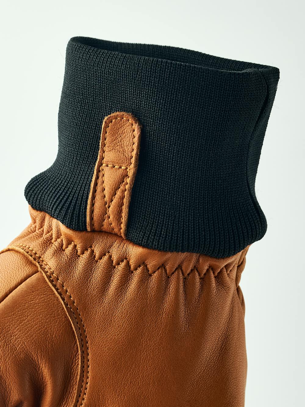 Light brown cow hide ski glove with black ribbed cuff (5 of 5)