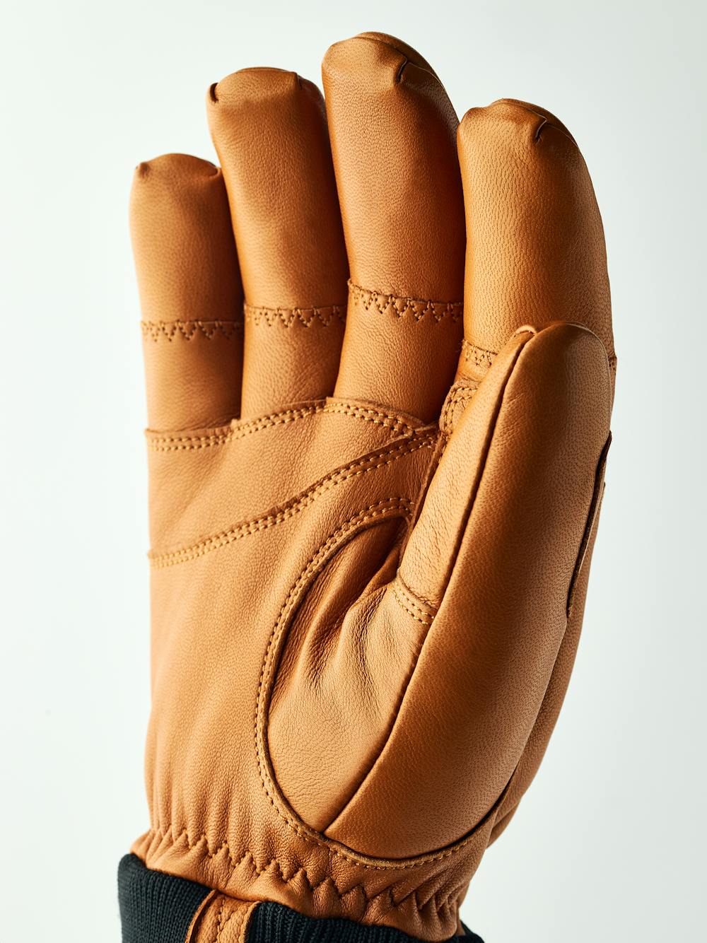Light brown cow hide ski glove with black ribbed cuff (2 of 5)