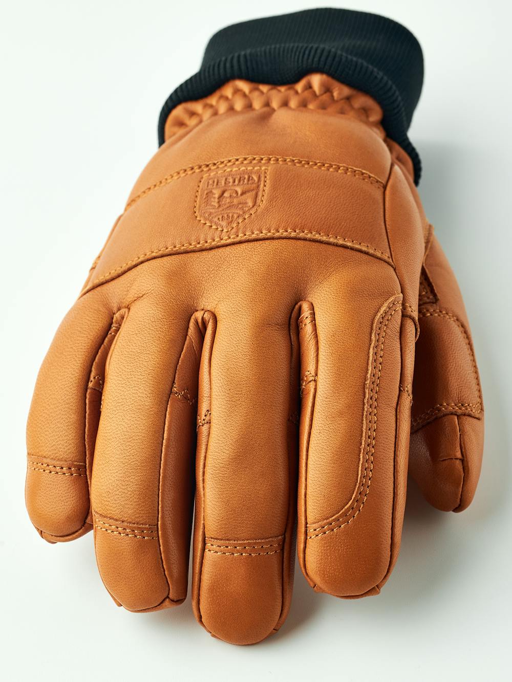 Light brown cow hide ski glove with black ribbed cuff (3 of 5)