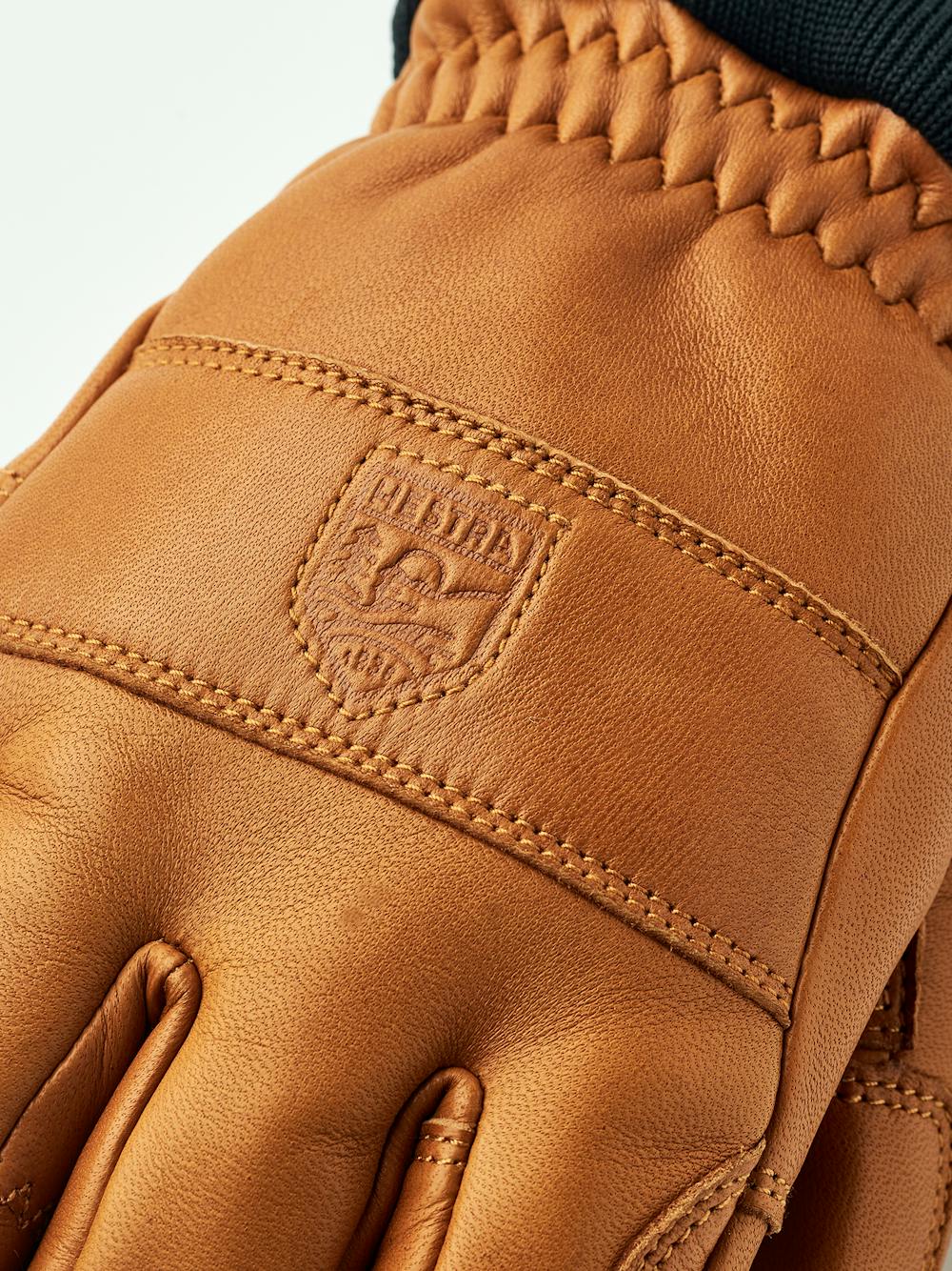 Light brown cow hide ski glove with black ribbed cuff (4 of 5)