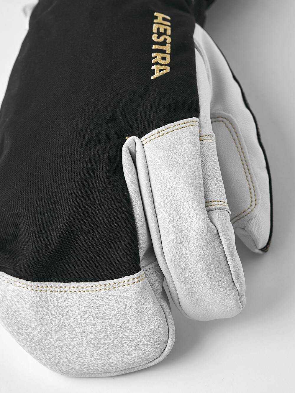 Black three finger glove with white goat leather palm and wrist adjustment  (2 of 6)