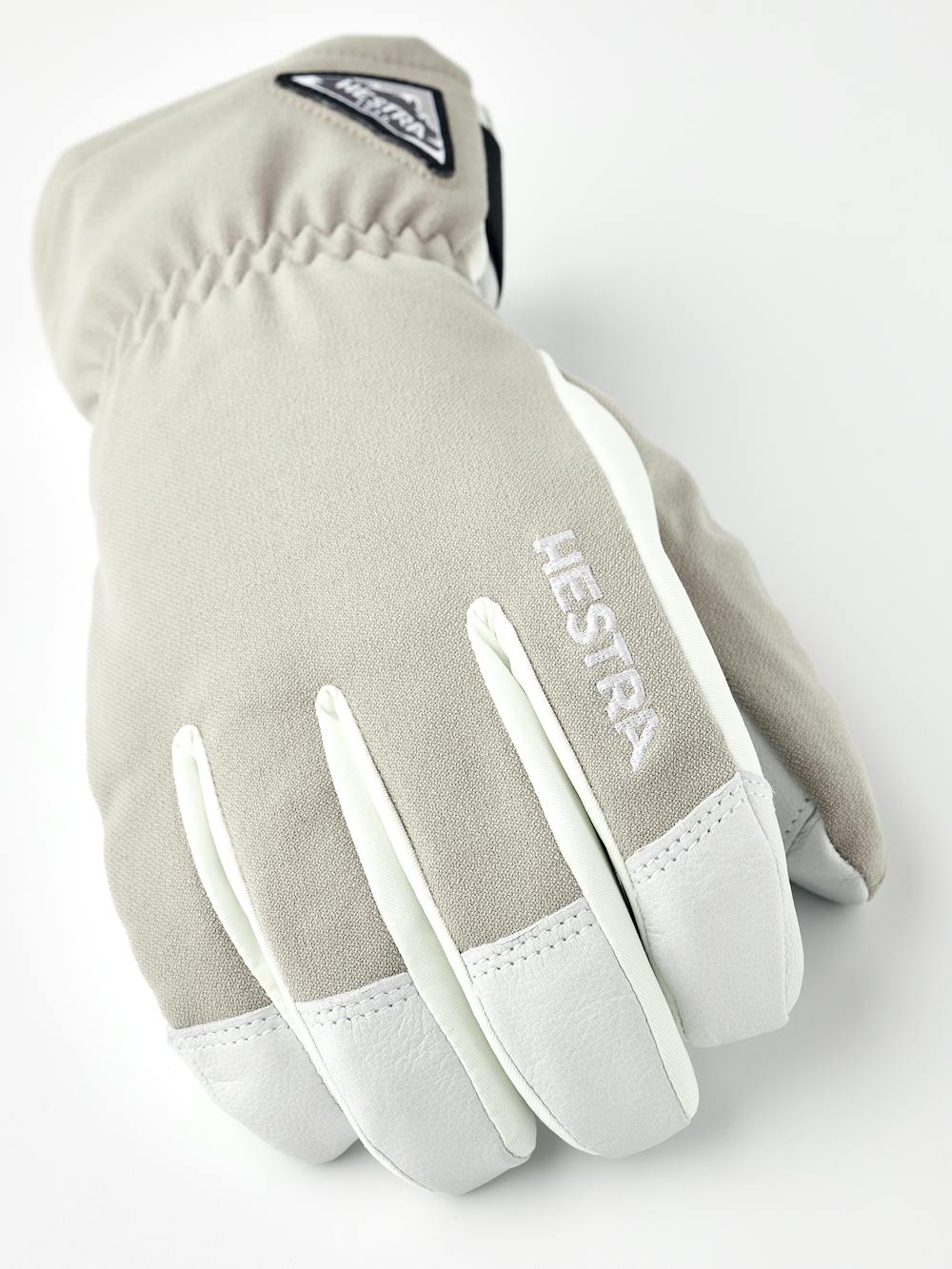 Beige skidhandske med vitt getskinn i innerhanden
(3 av 6)