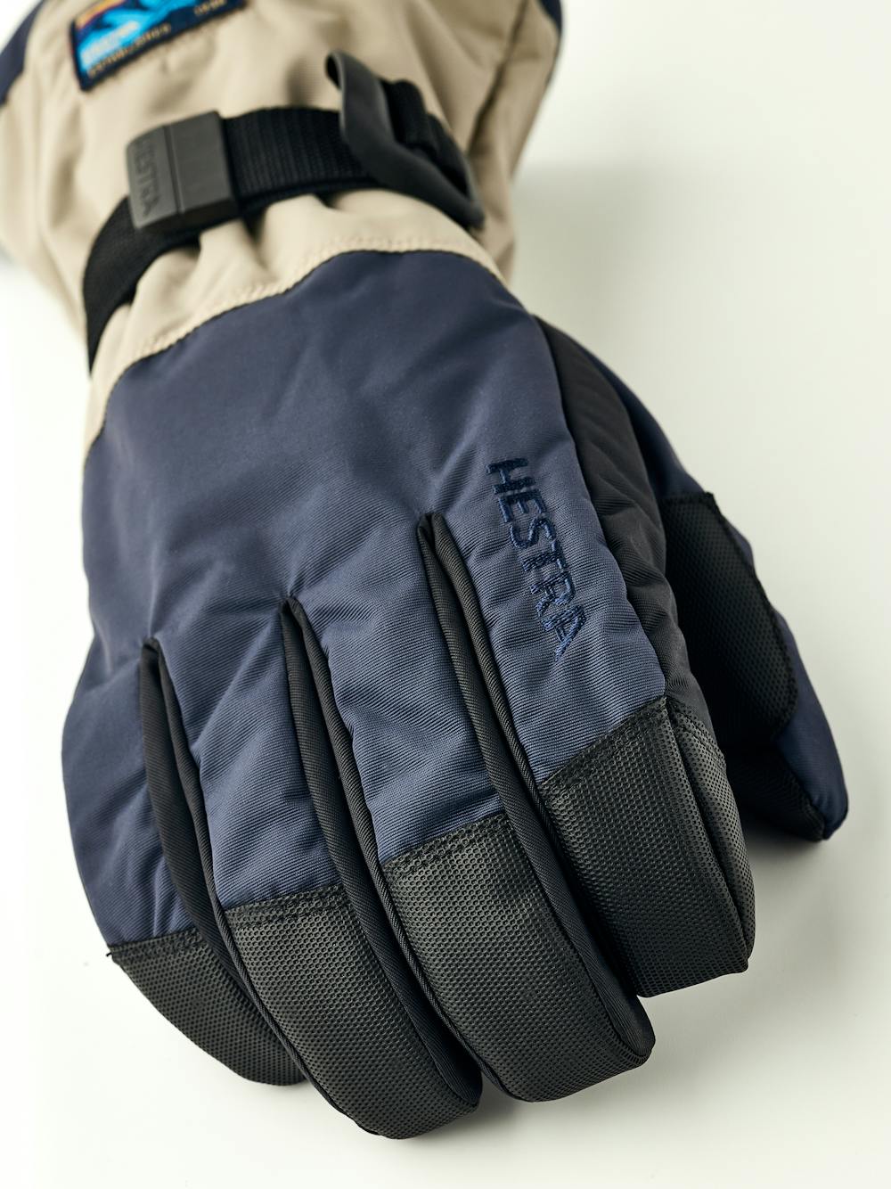 Blue and beige fabric ski glove with black synthetic palm (3 of 5)