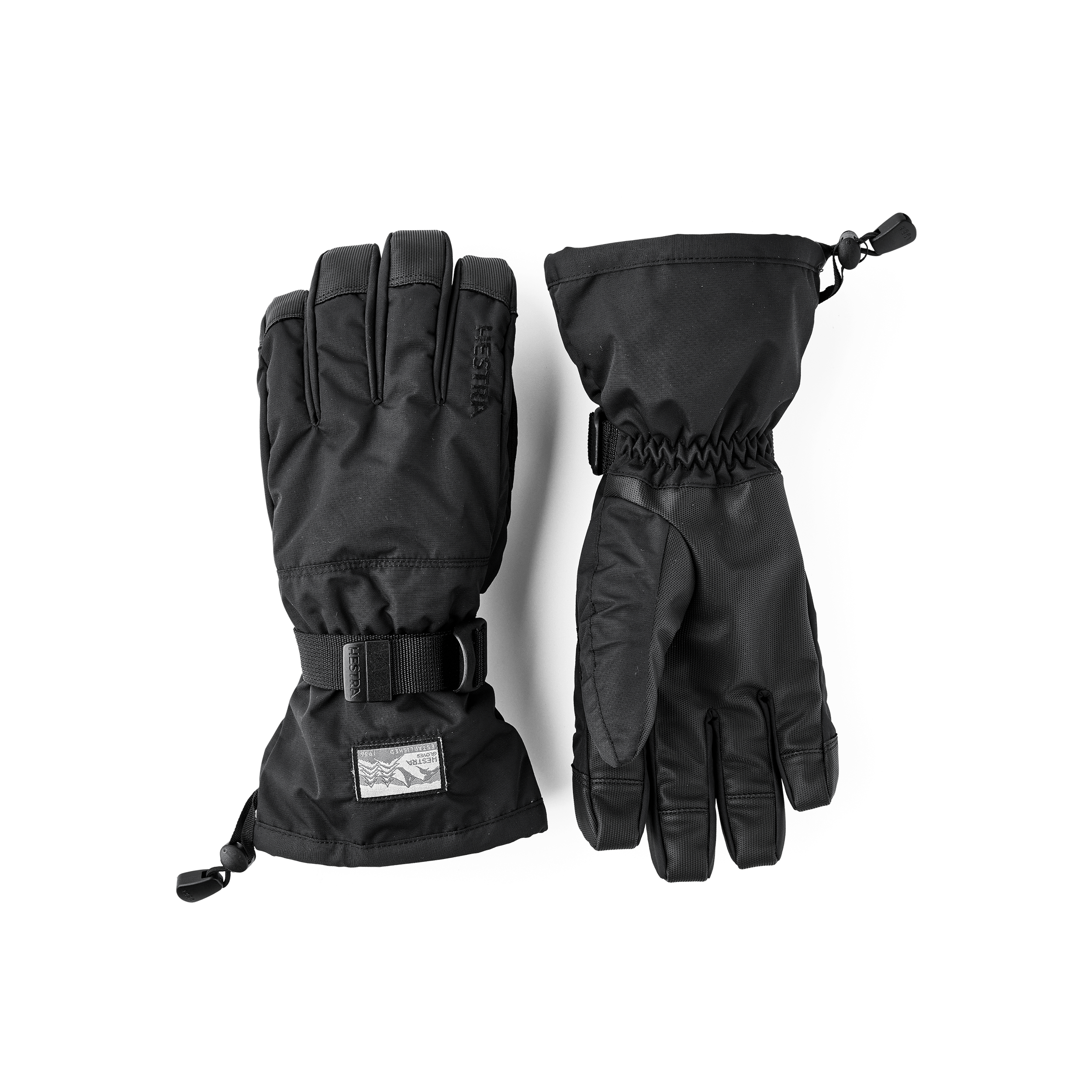 Svart skidhandske i tyg med syntetmaterial i innerhanden
(1 av 5)