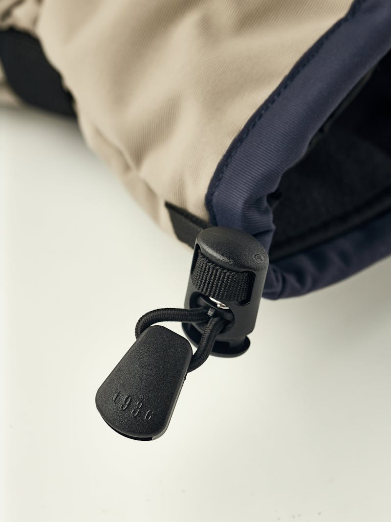 Blue and beige fabric ski glove with black synthetic palm (5 of 5)
