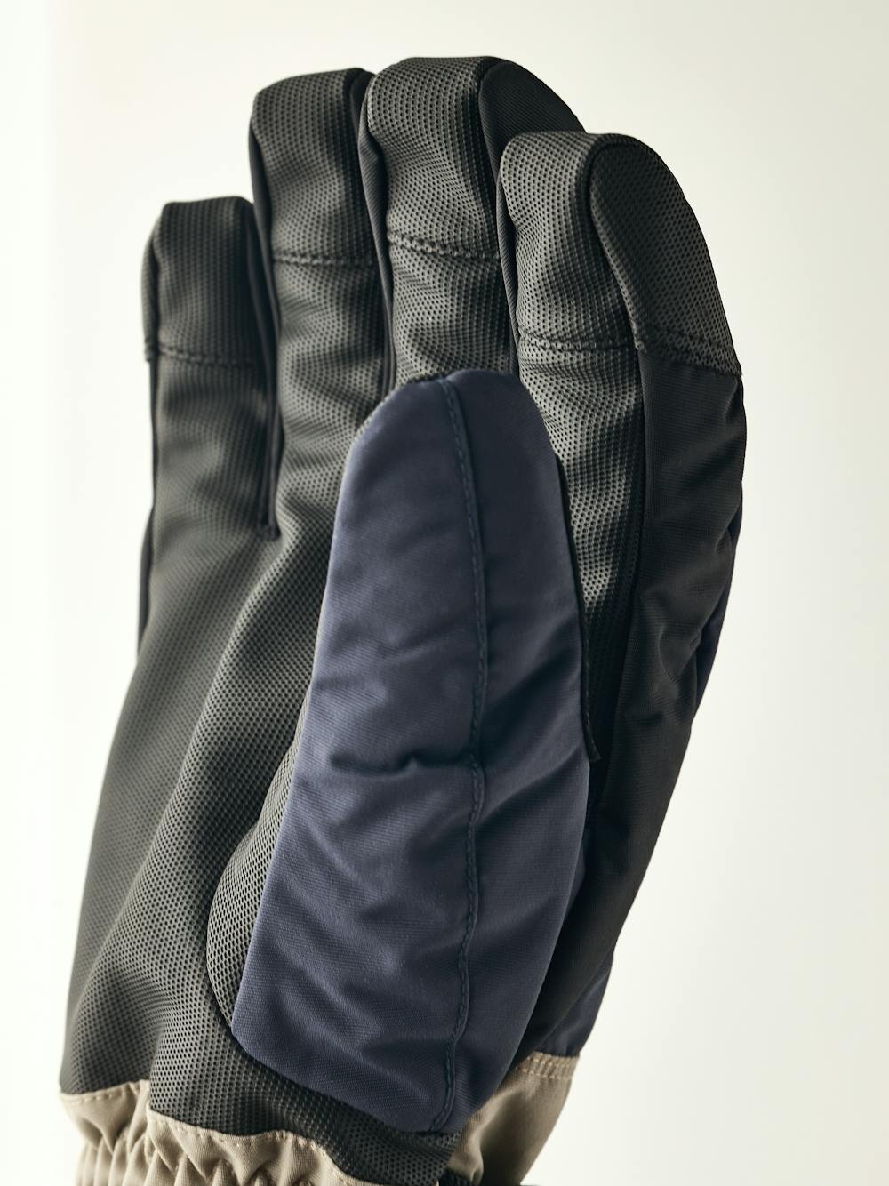 Blue and beige fabric ski glove with black synthetic palm (2 of 5)