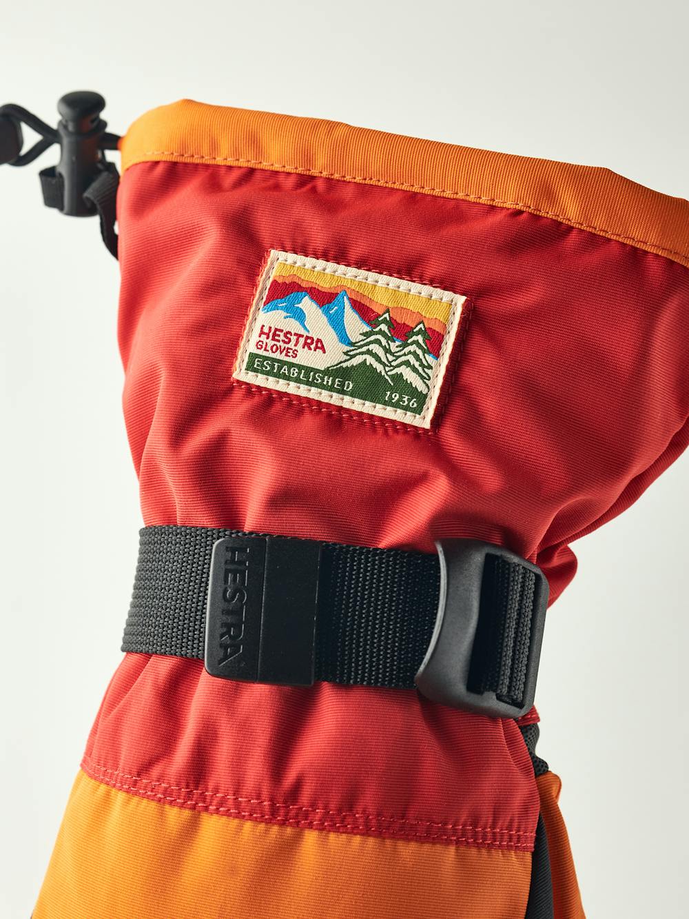 Orange and red fabric mitten with black synthetic palm (4 of 5)