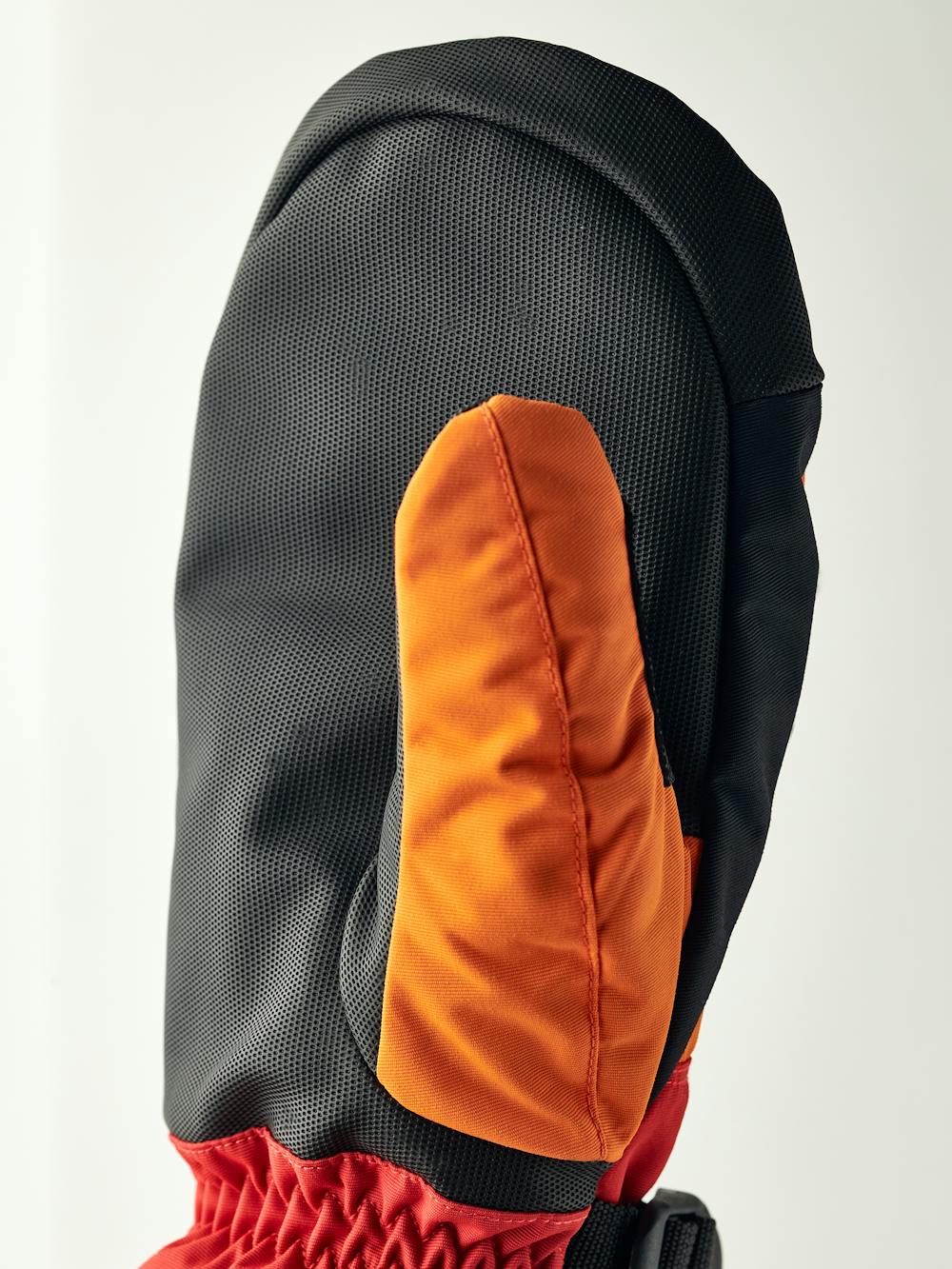 Orange and red fabric mitten with black synthetic palm (2 of 5)