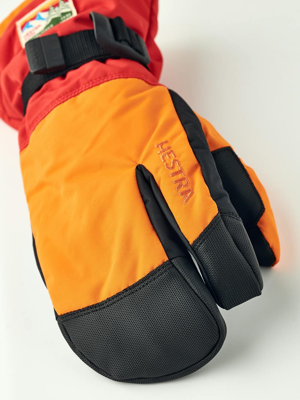 Orange and red fabric three finger glove with black synthetic palm  (3 of 5)