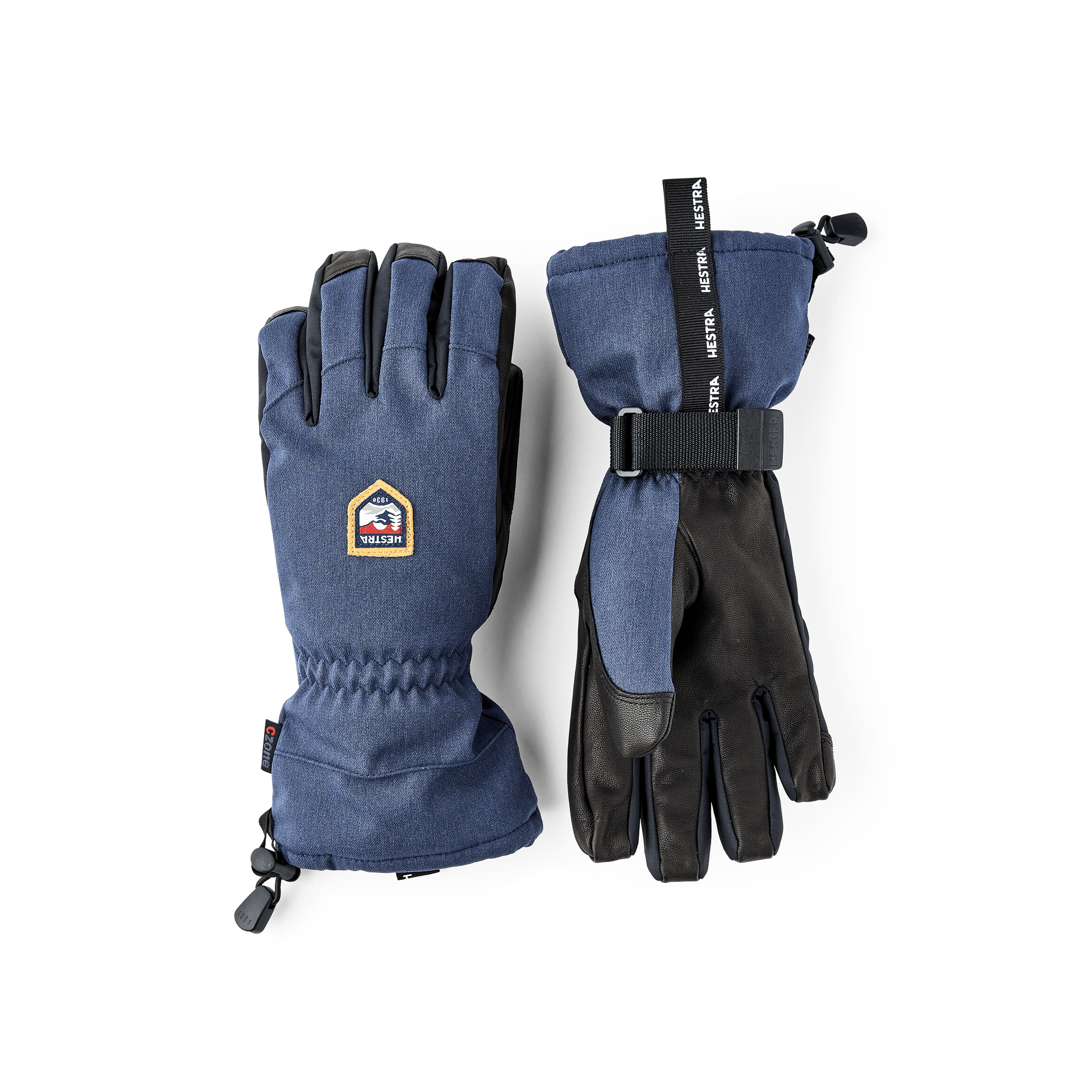 Mörkblå skidhandske med svart getskinn i innerhanden och handledsjustering
(1 av 6)