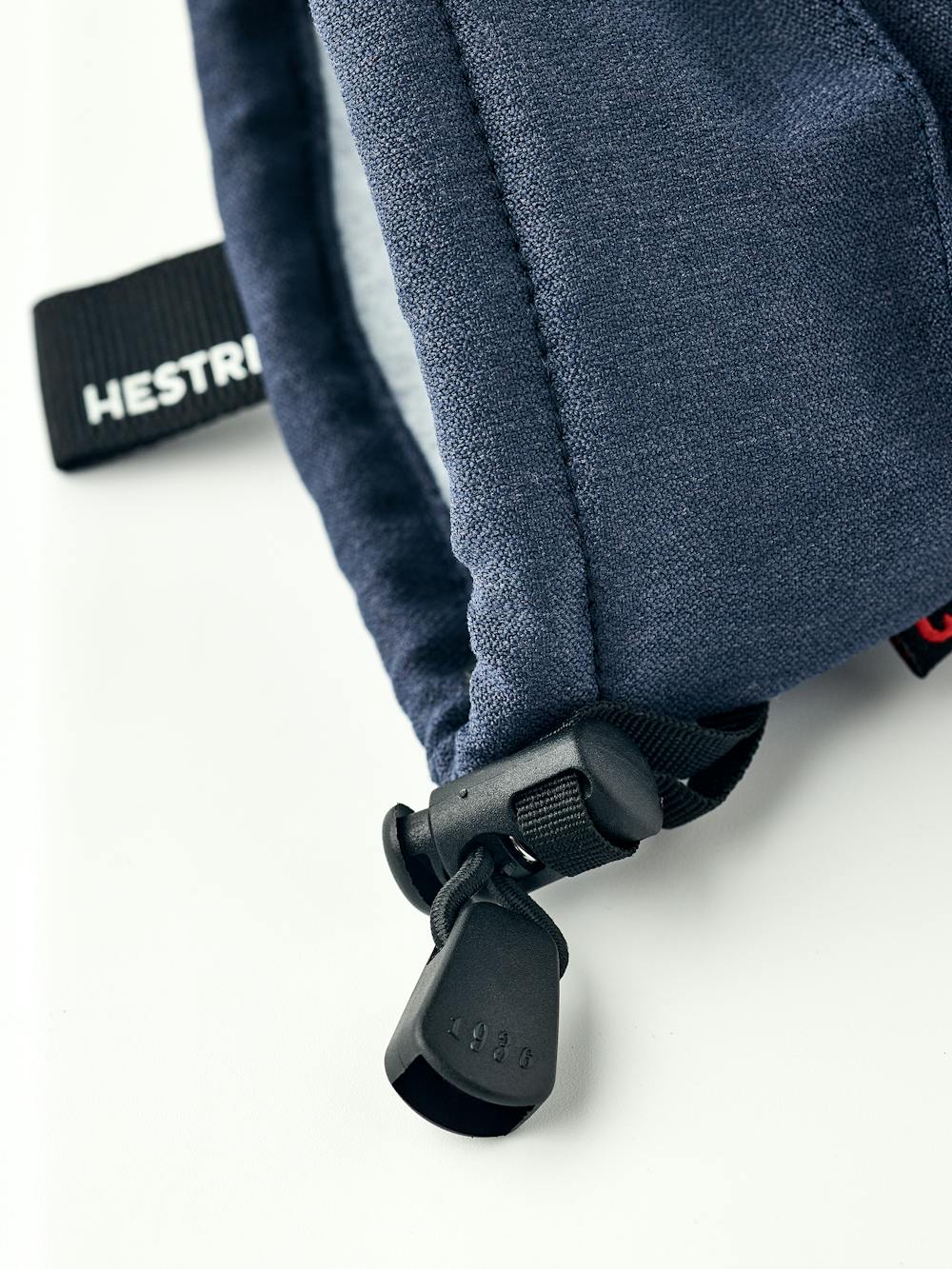 Dark blue three finger glove with black goat leather palm and wrist adjustment (5 of 6)