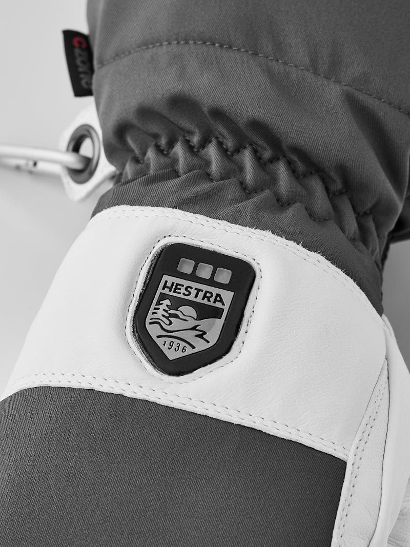 Grauer beheizbarer Fausthandschuh mit weißem Ziegenleder an der Innenhand (5 oder 7)