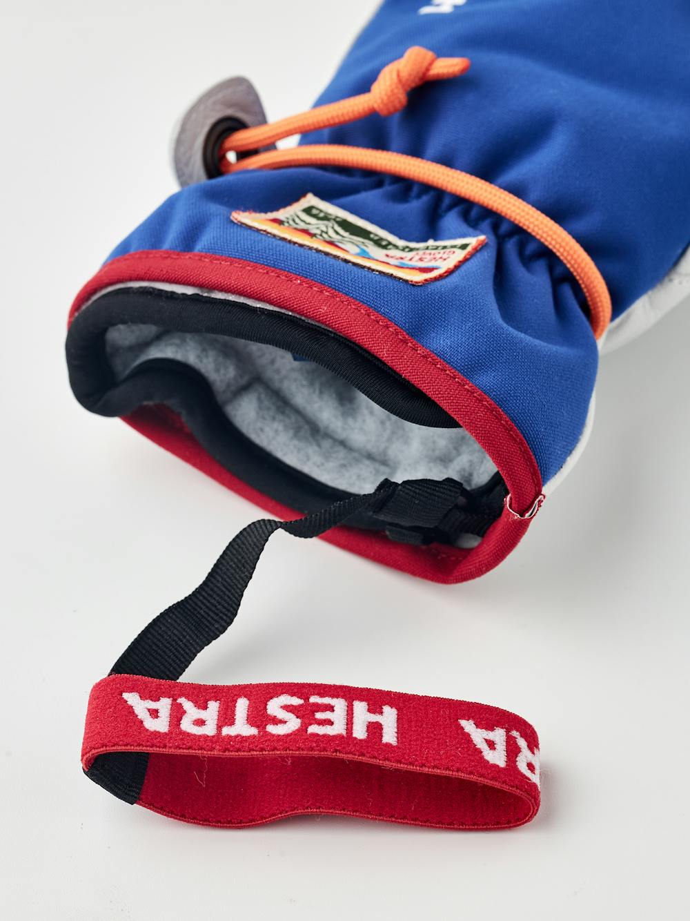 Blue mitten with white goat leather palm and wrist strap (6 of 6)