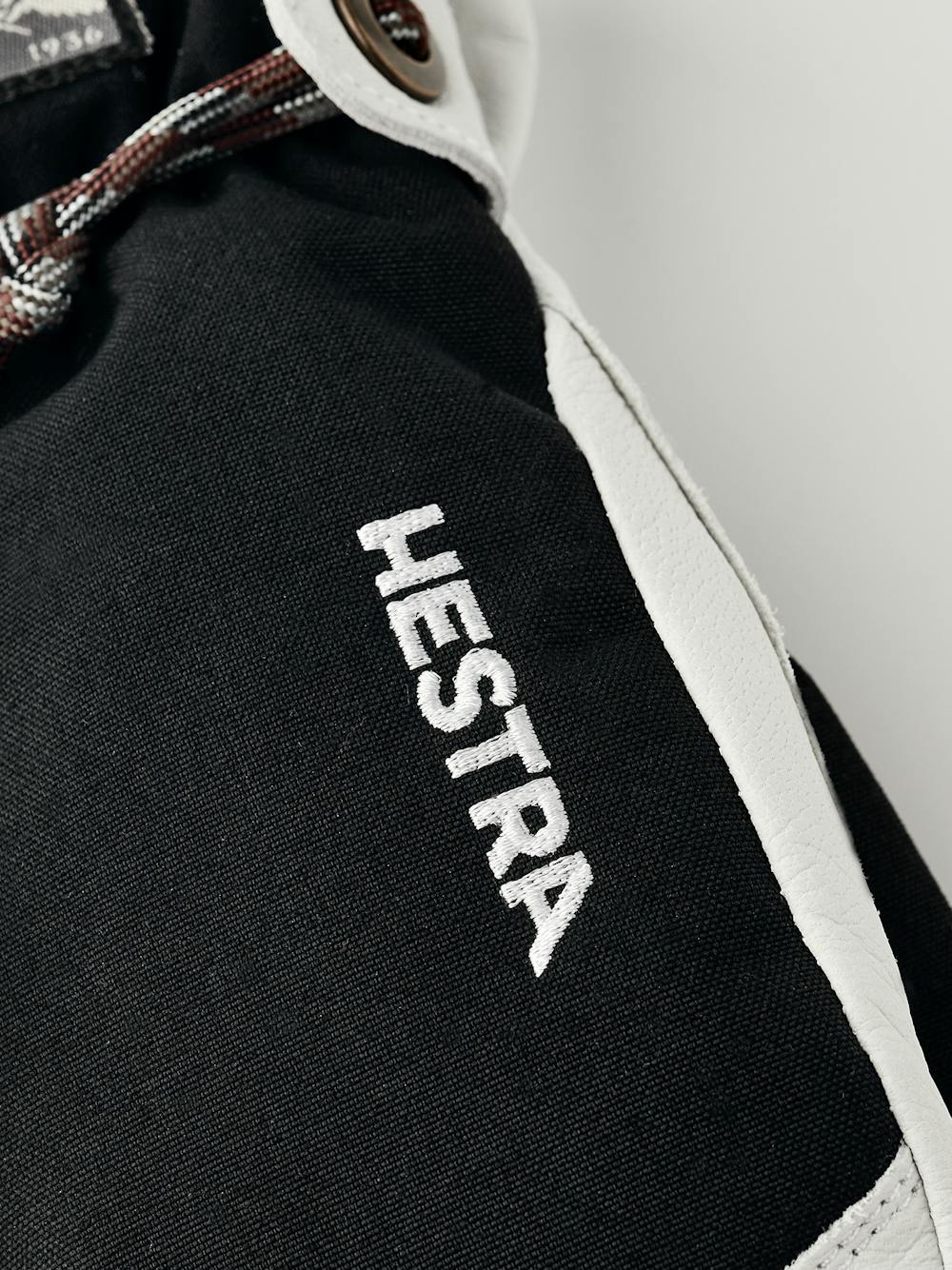 Black mitten with white goat leather palm and wrist strap (5 of 6)