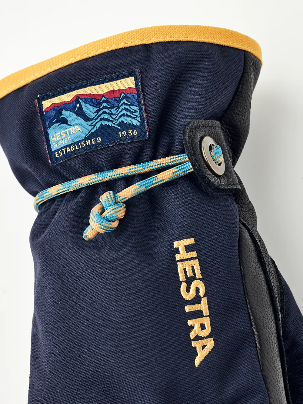 Dark blue children’s glove with black goat leather palm and wrist strap (2 of 5)