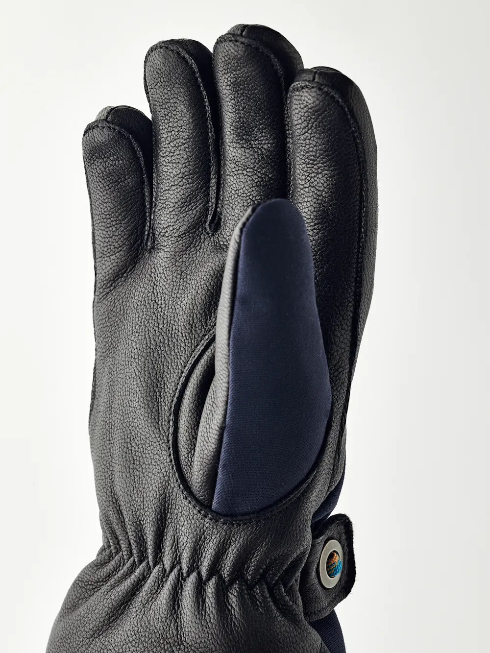 Dark blue children’s glove with black goat leather palm and wrist strap  (4 of 5)