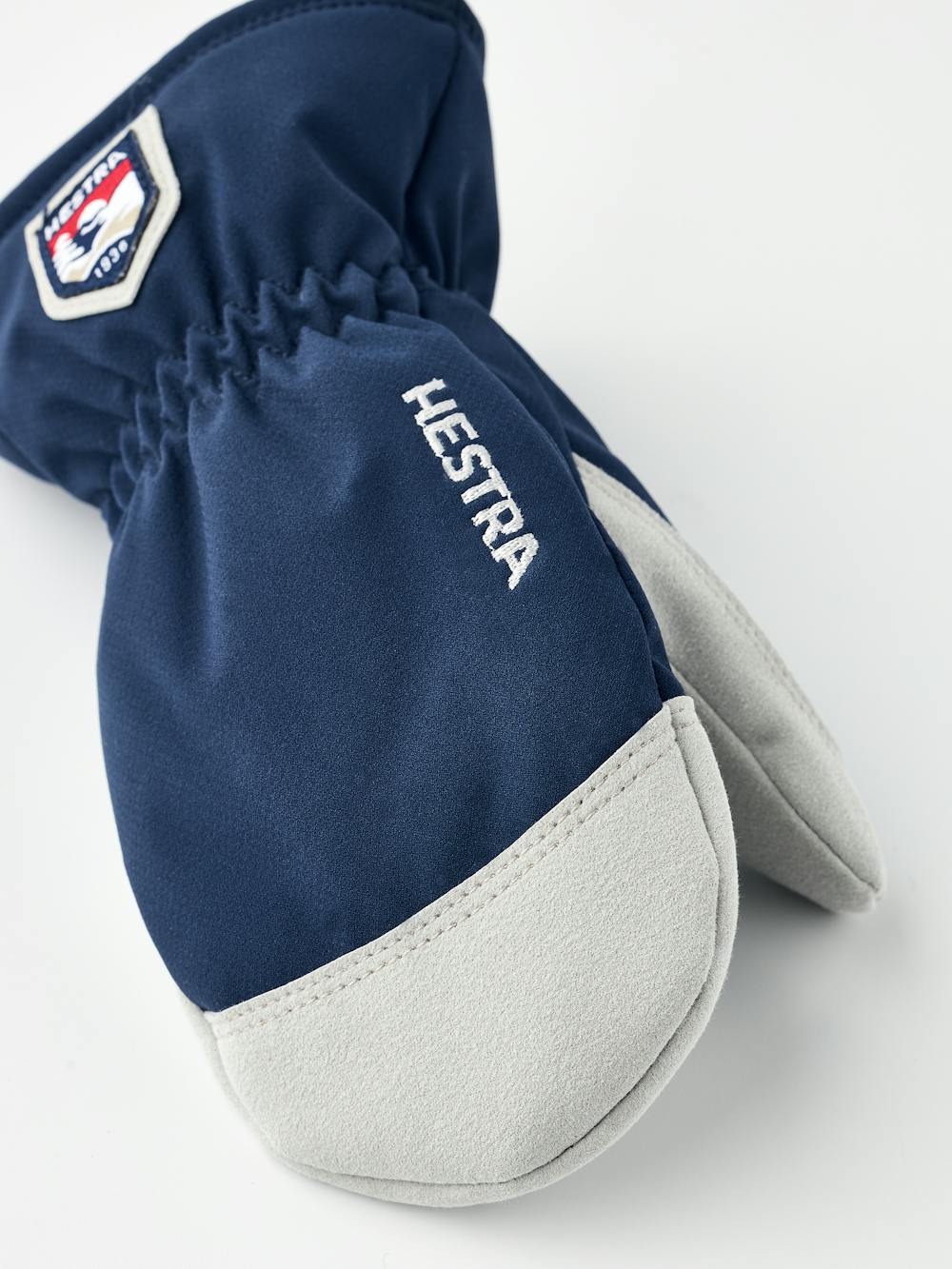 Dark blue fabric mitten with white synthetic suede palm (2 of 4)