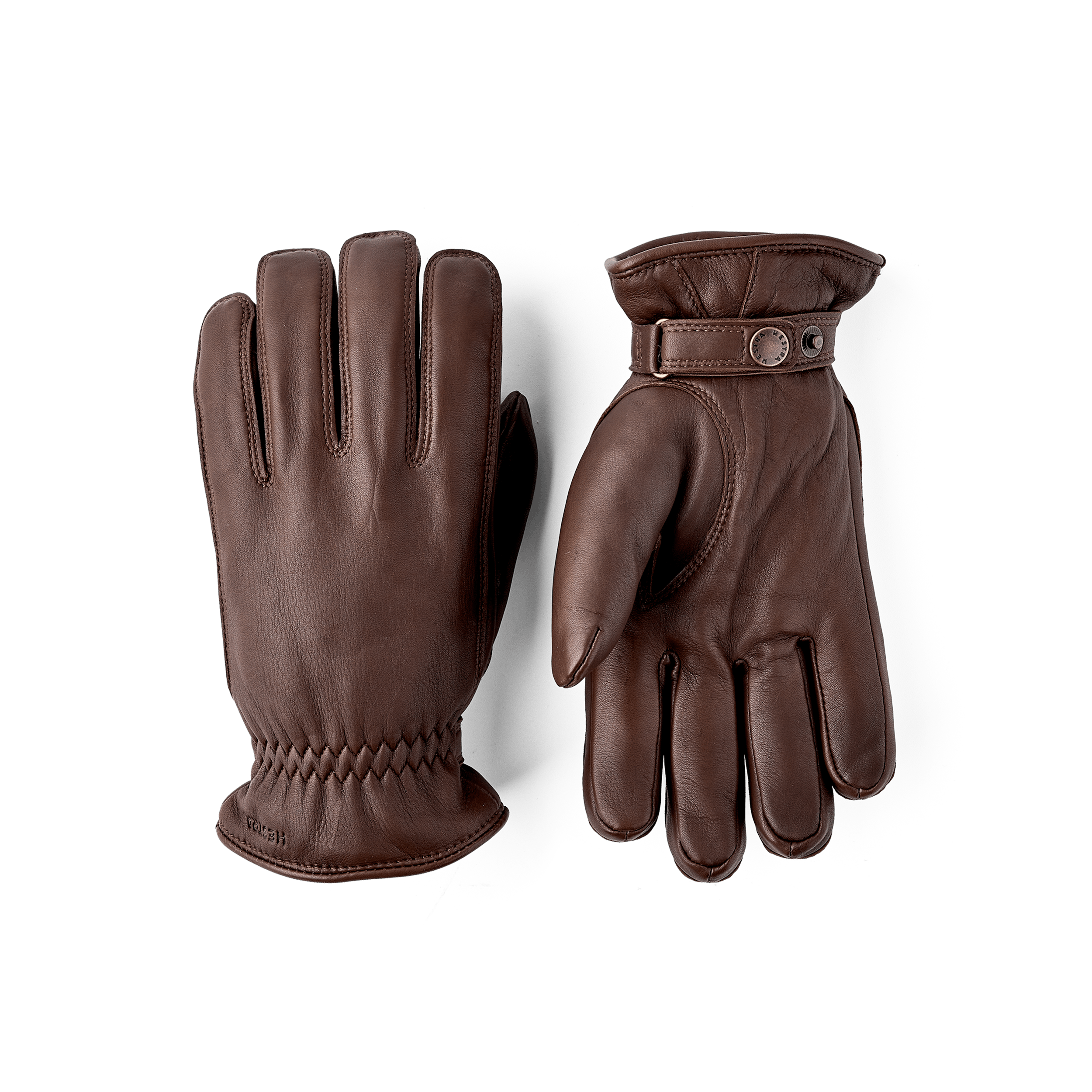 Brown machine-sewn hairsheep leather glove with leather strap and button
(1 of 5)
