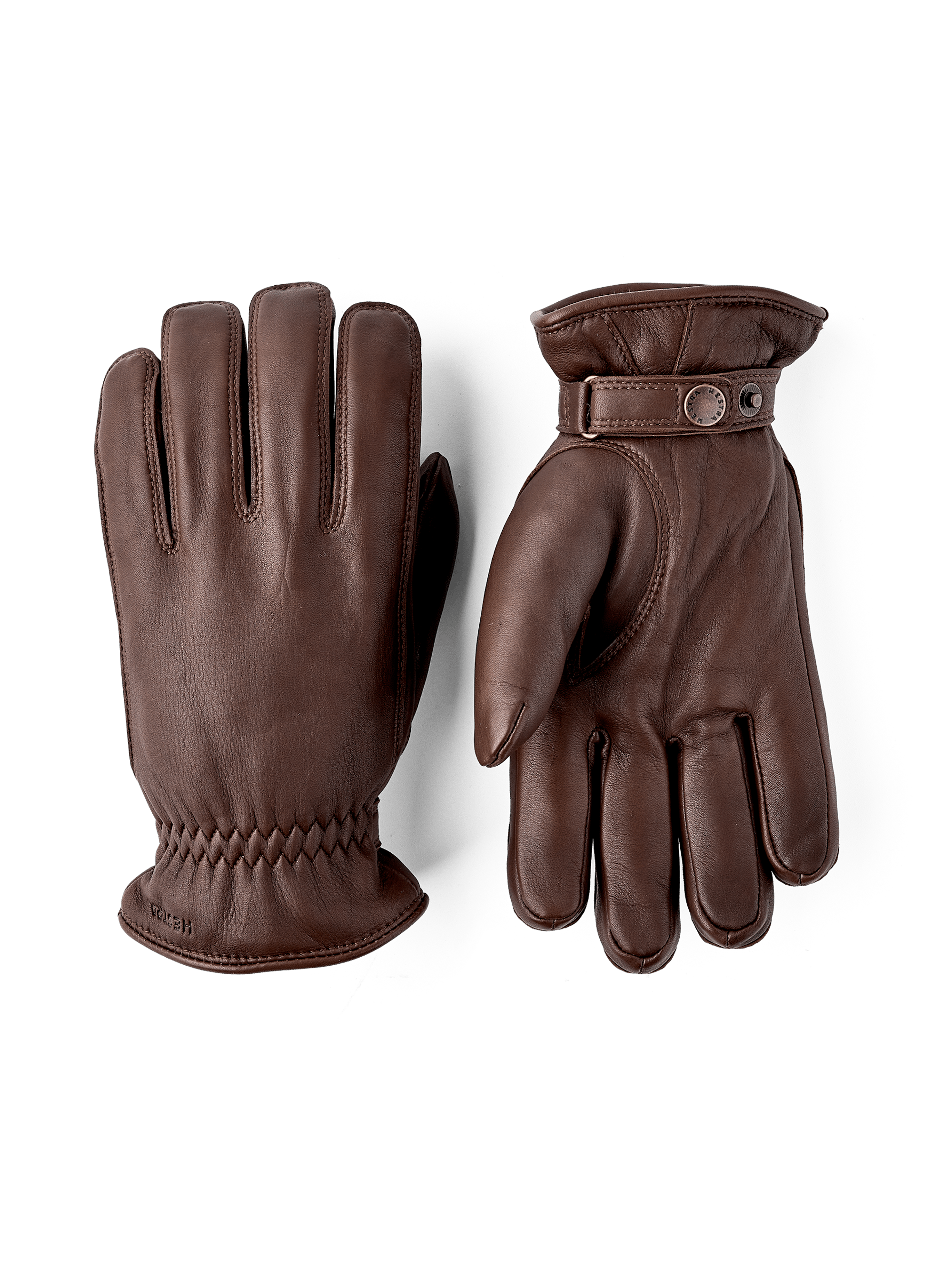 Brun maskinsydd handske i lammnappa med läderrem och knapp
(1 av 5)