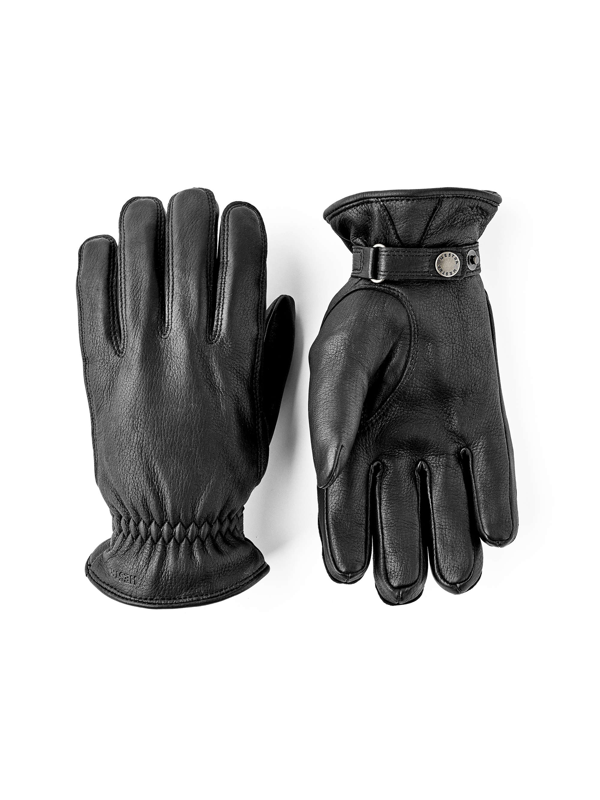 Black machine-sewn hairsheep leather glove with leather strap and button
(1 of 5)