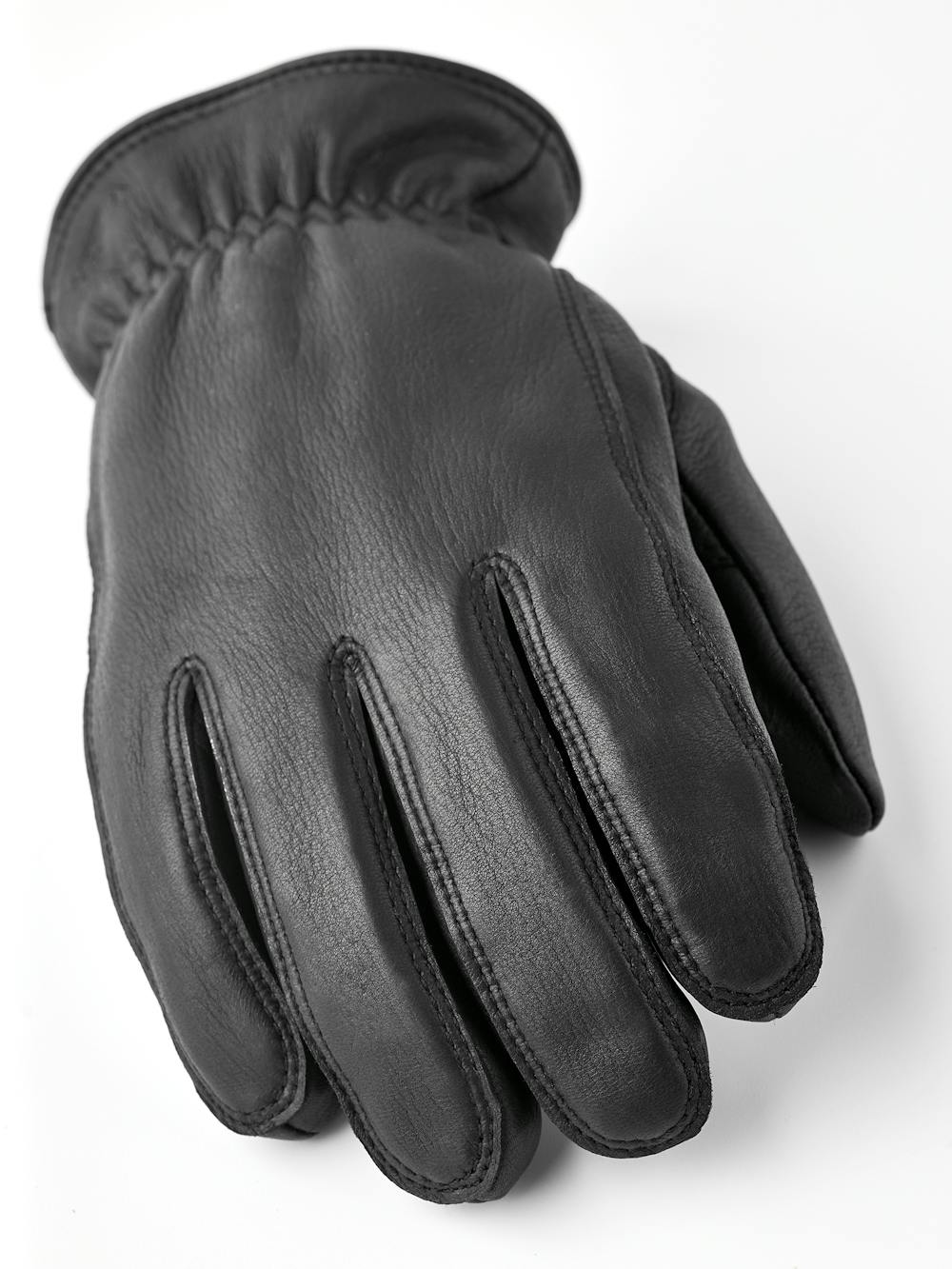 Black machine-sewn hairsheep leather glove with leather strap and button
 (2 of 5)