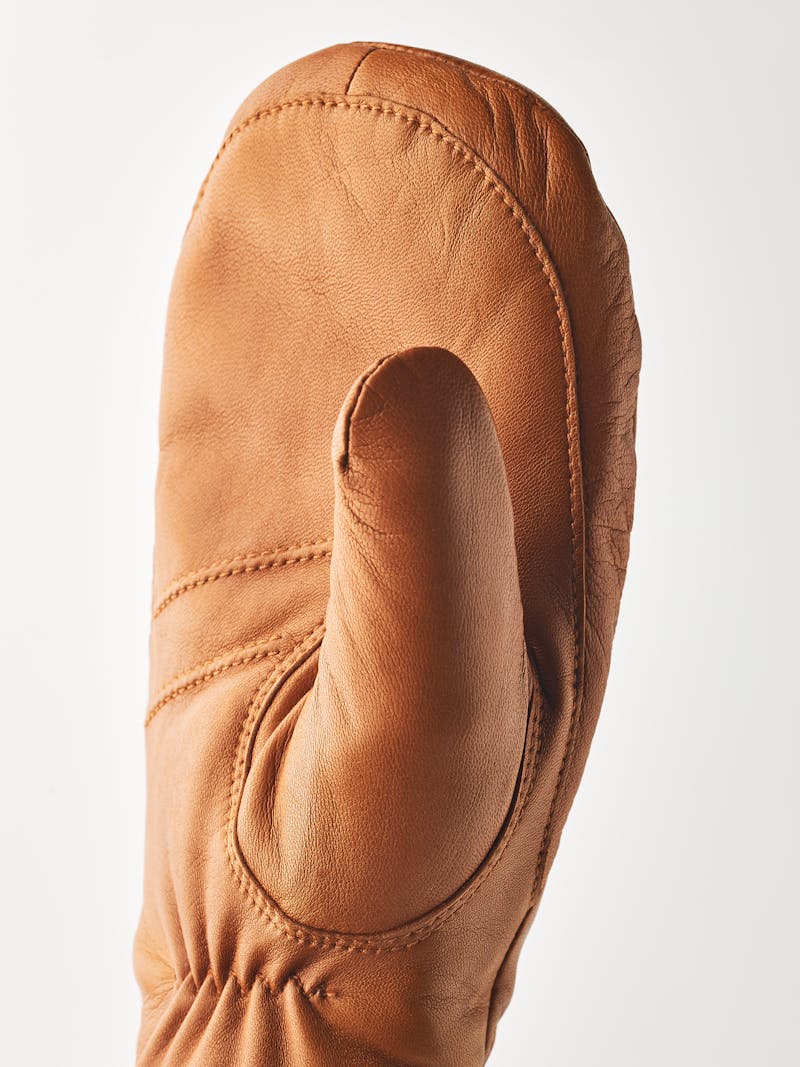 Light brownish-yellow machine-sewn hairsheep leather mitten with white visible wool fleece trim
 (2 of 5)