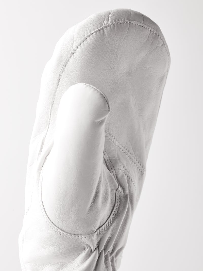 White machine-sewn hairsheep leather mitten with visible wool fleece trim
 (2 of 5)