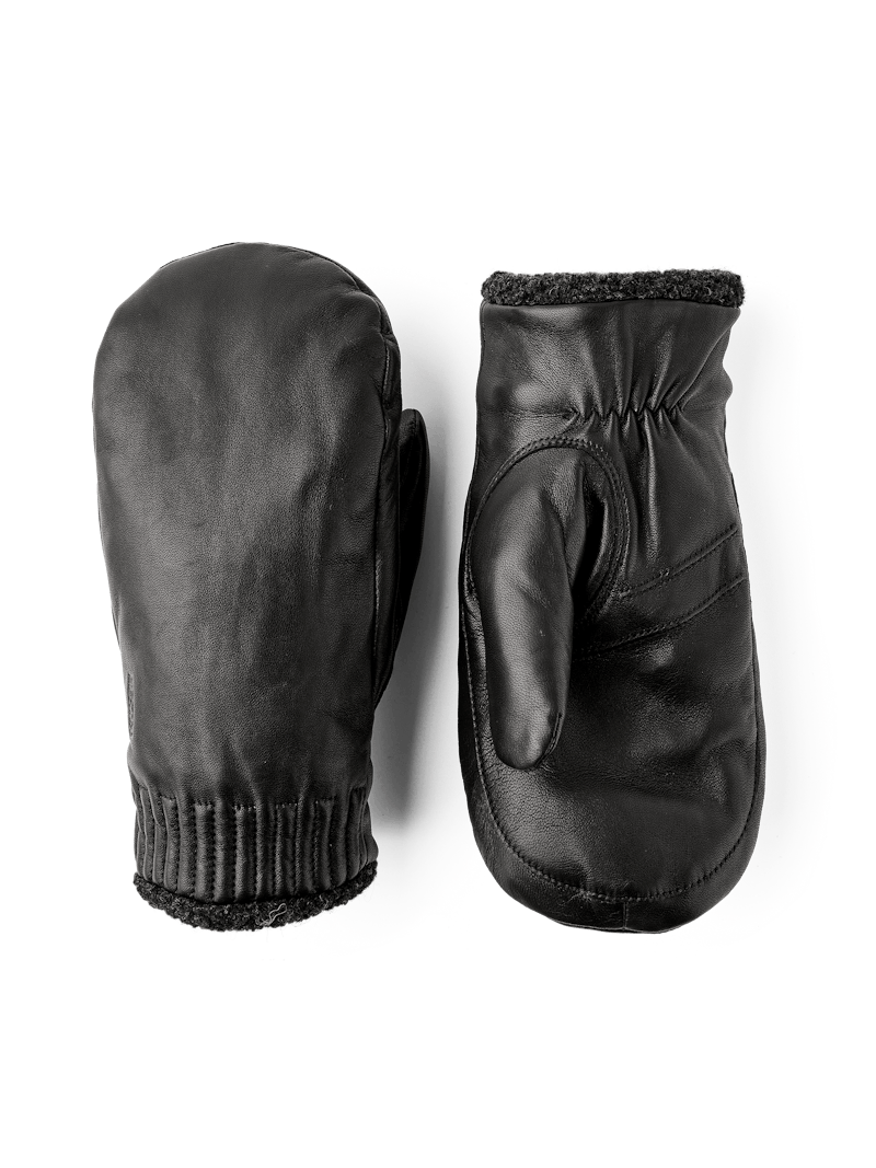 Black machine-sewn hairsheep leather mitten with visible wool fleece trim
 (1 of 5)