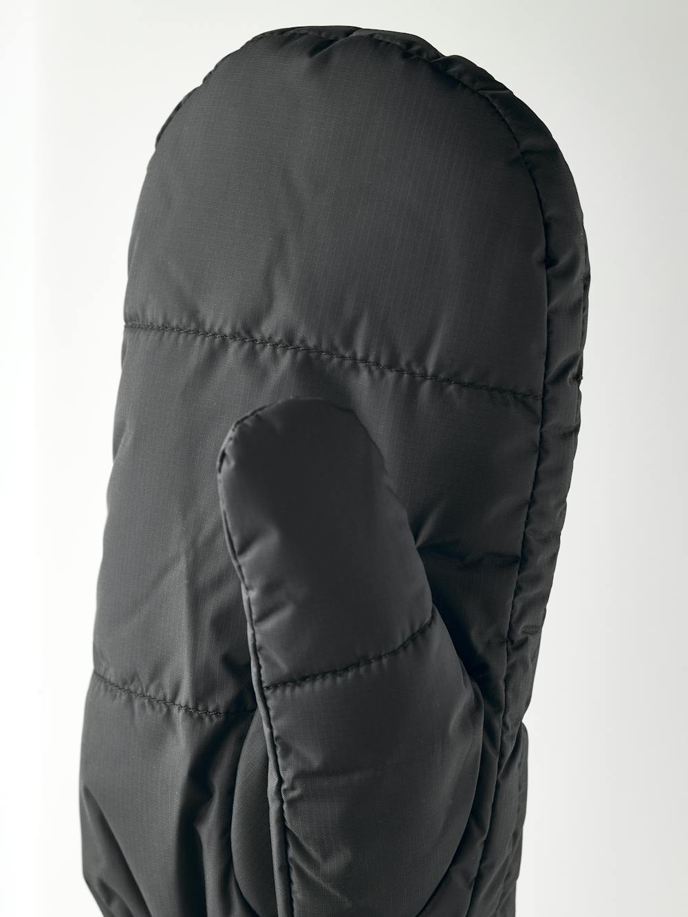 Black fabric mitten with knitted cuff
(2 of 3)