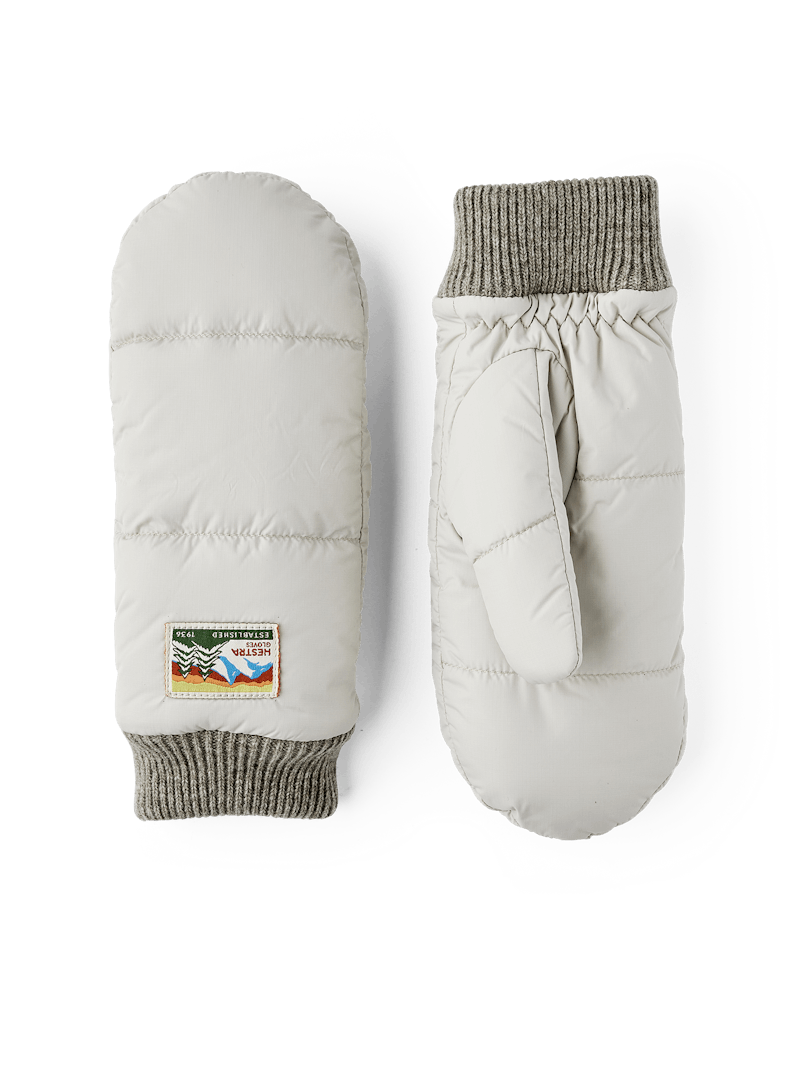 Light beige fabric mitten with light gray knitted cuff
 (1 of 3)