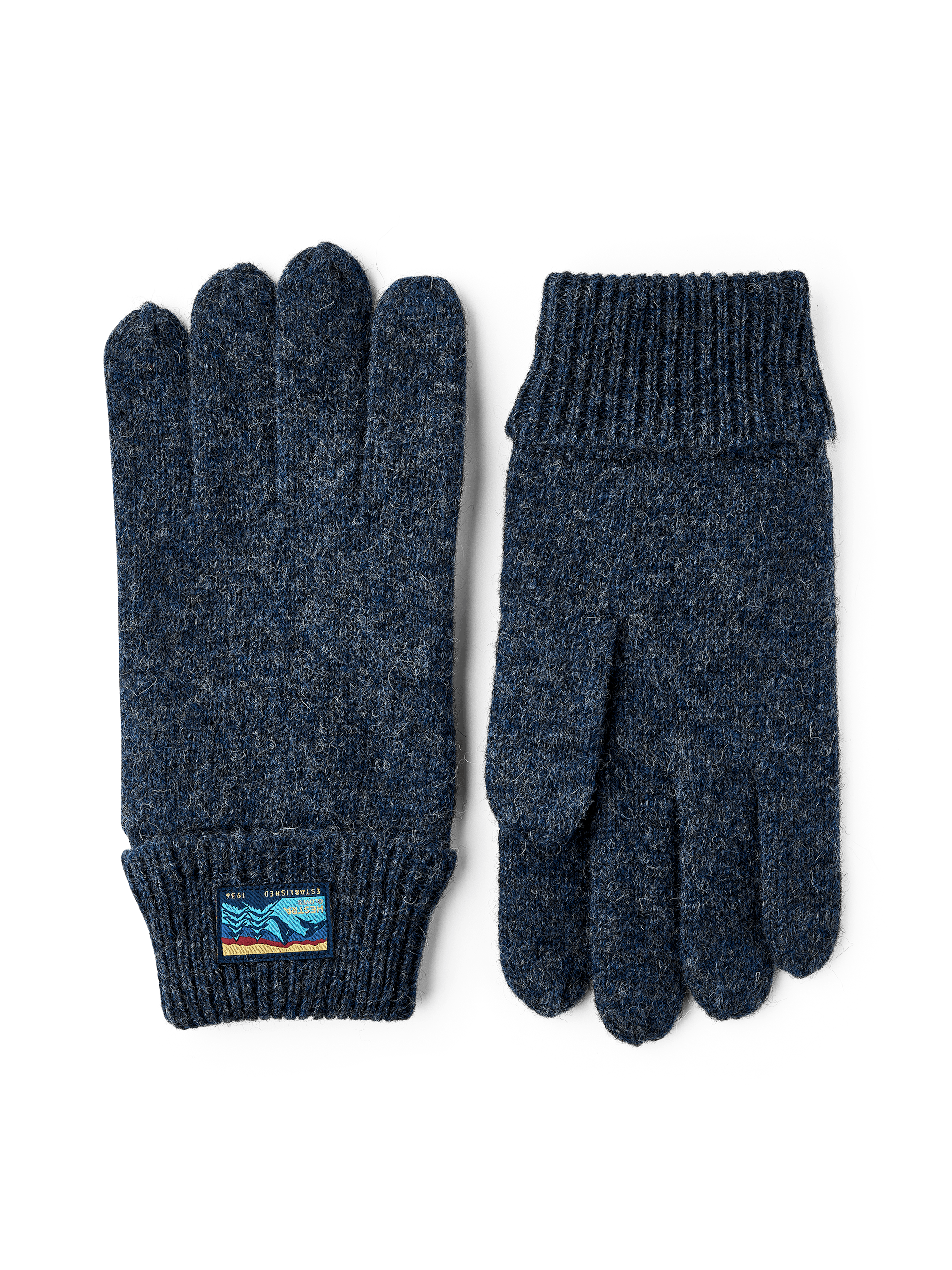 Dark blue glove in mottled wool yarn (1 of 3)