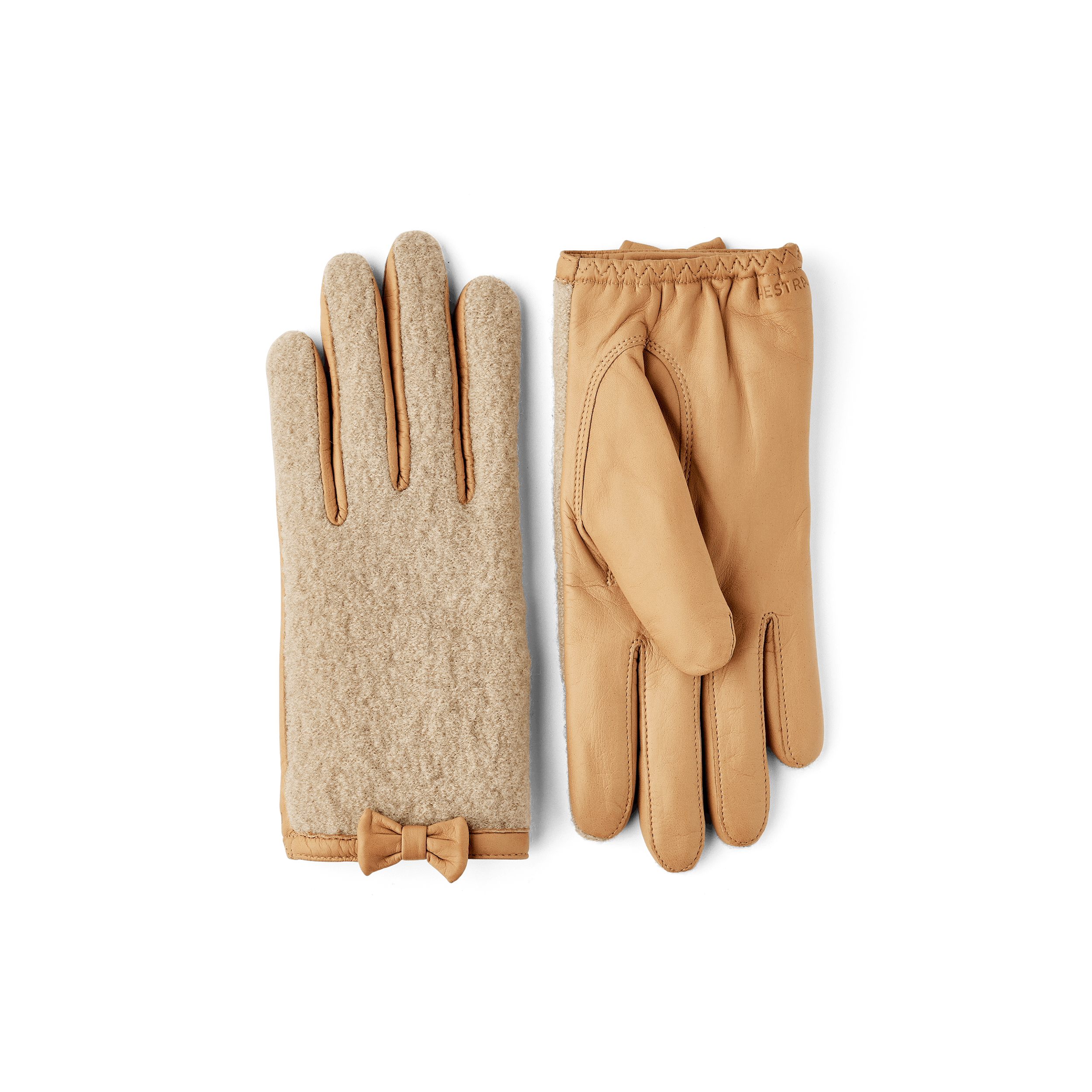 Dark beige hairsheep leather glove with beige bouclé knitted back and small bow
(1 of 5)