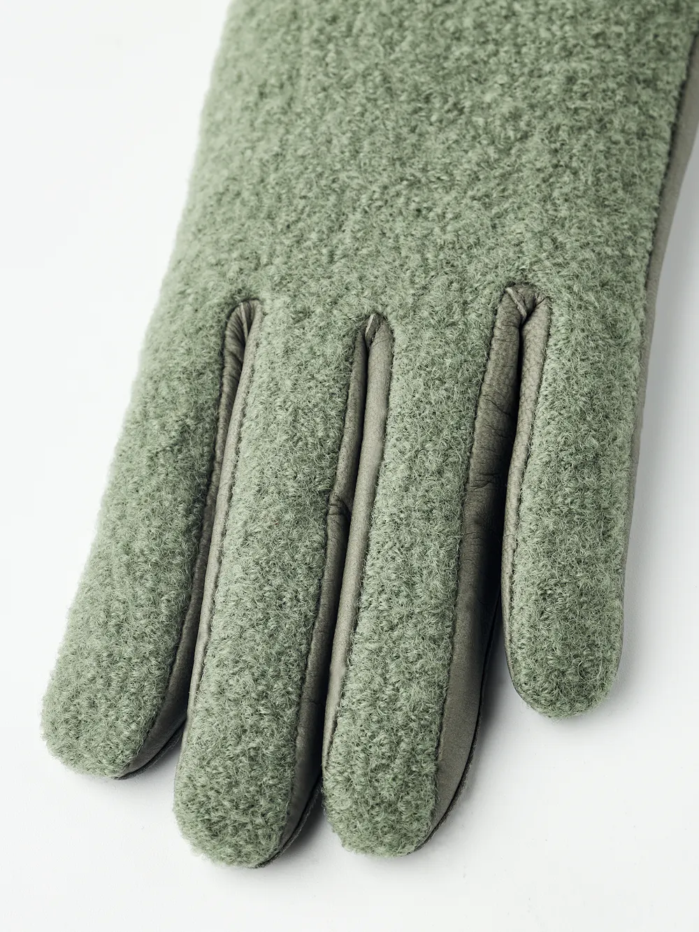 Green hairsheep leather glove with bouclé knitted back and small bow
(3 of 5)