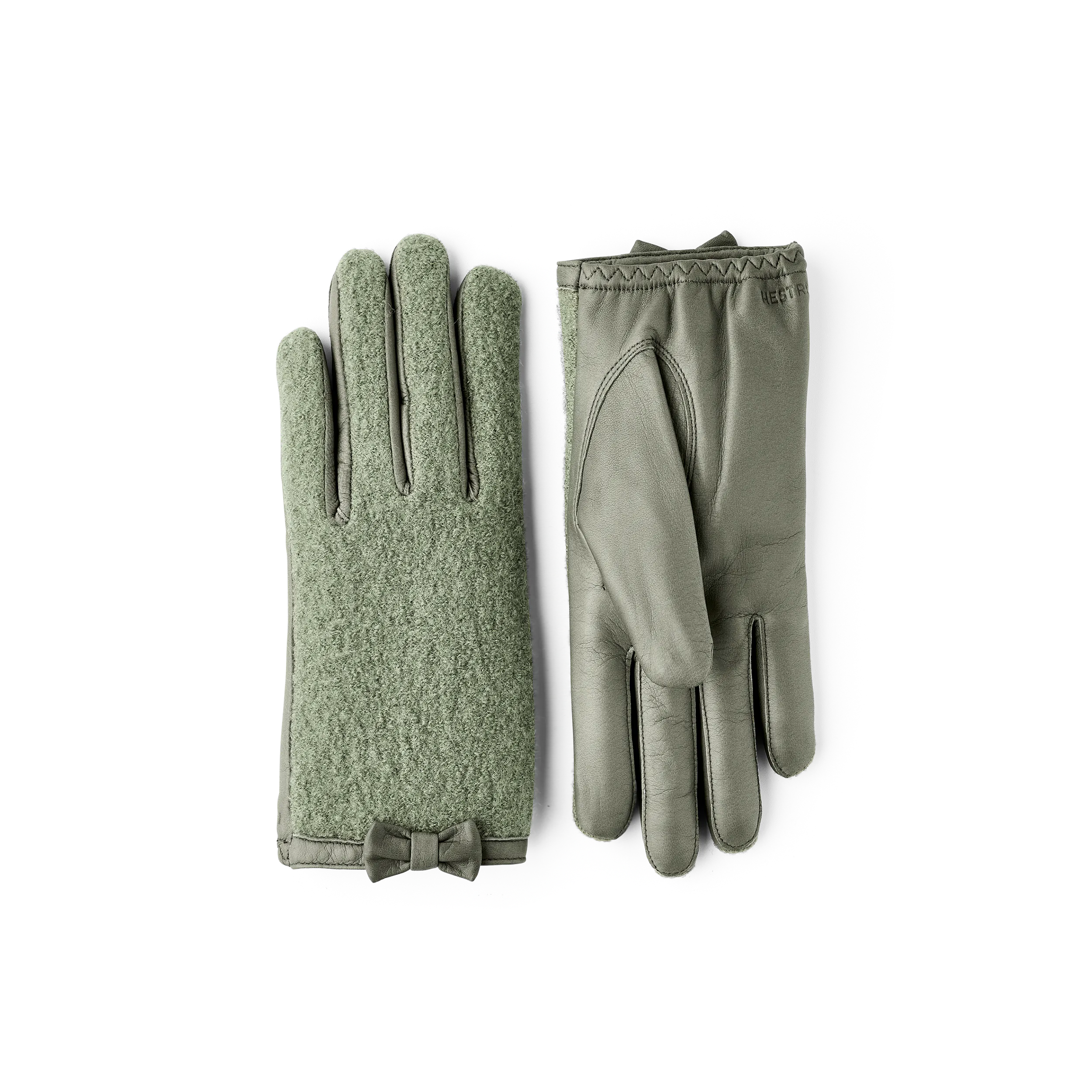 Green hairsheep leather glove with bouclé knitted back and small bow
 (1 of 5)