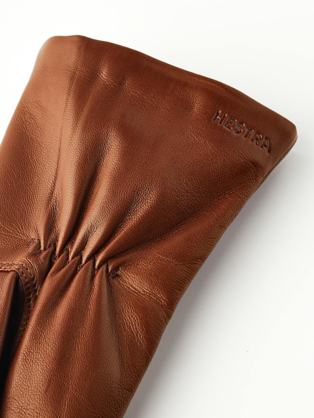 Medium brown machine-sewn hairsheep leather glove with zip
(5 of 6)